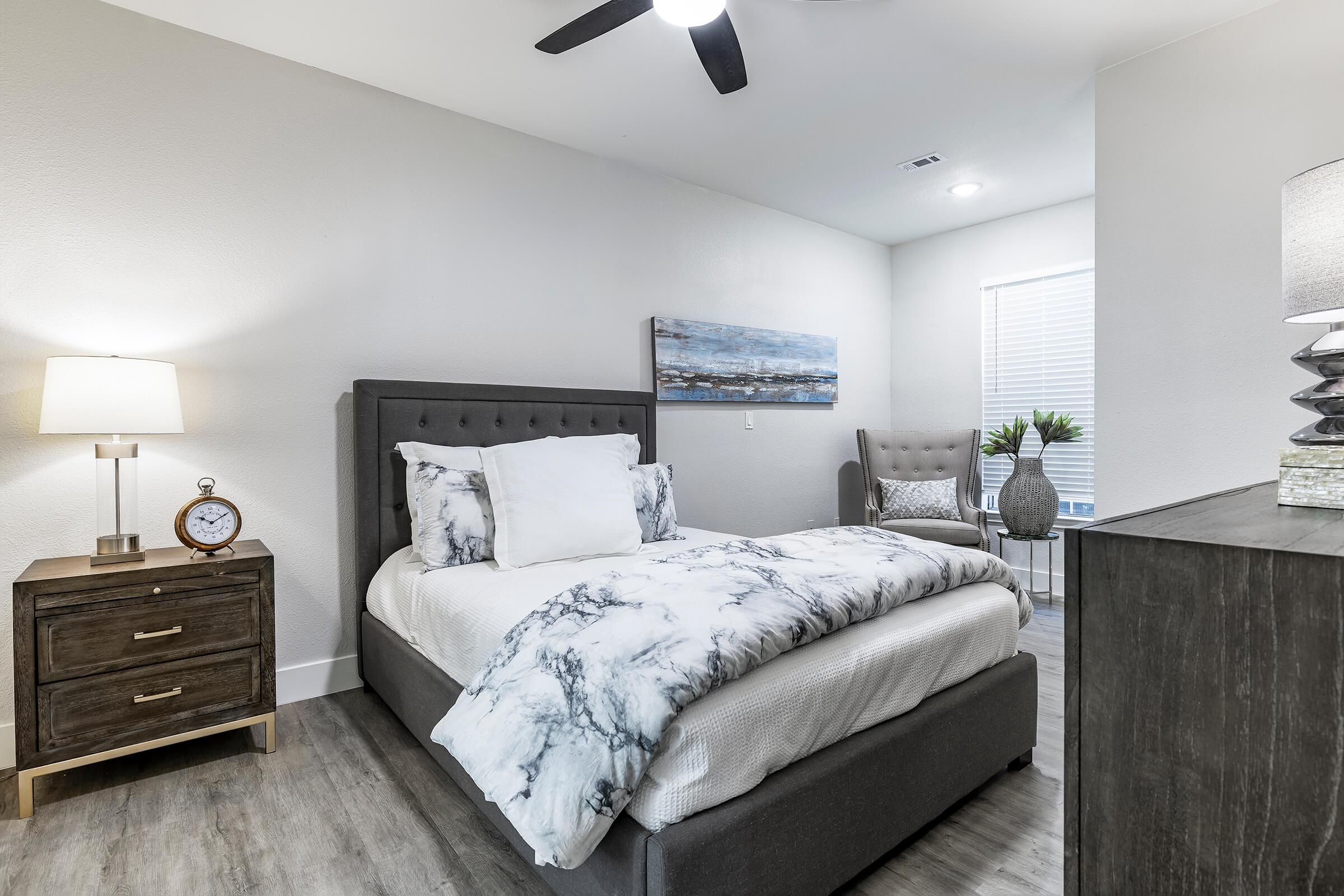 bedroom with wooden floors