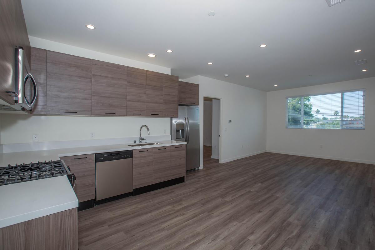 a kitchen with a wood floor