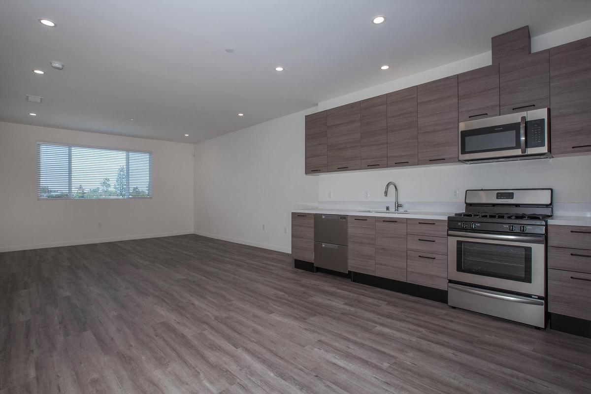 a kitchen with a wood floor