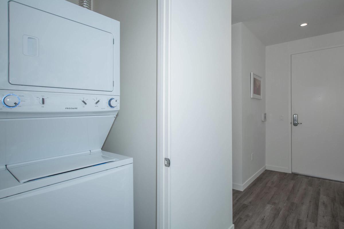 a white refrigerator freezer sitting in a room