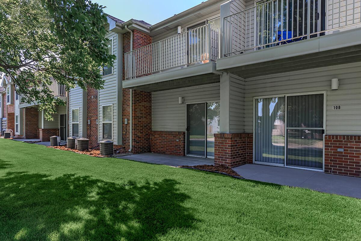 a large lawn in front of a house