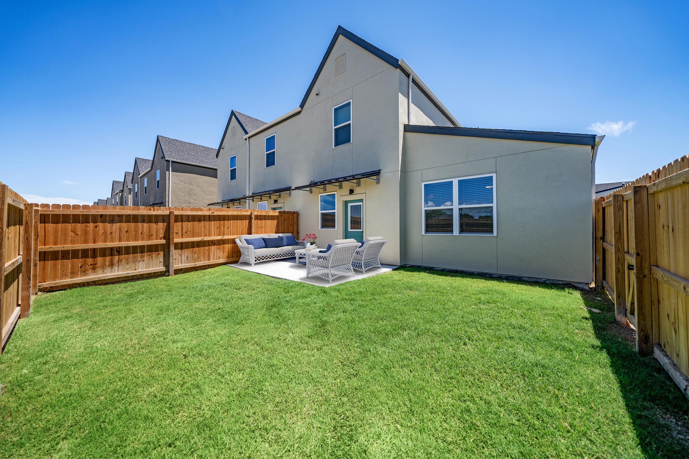 a large lawn in front of a house