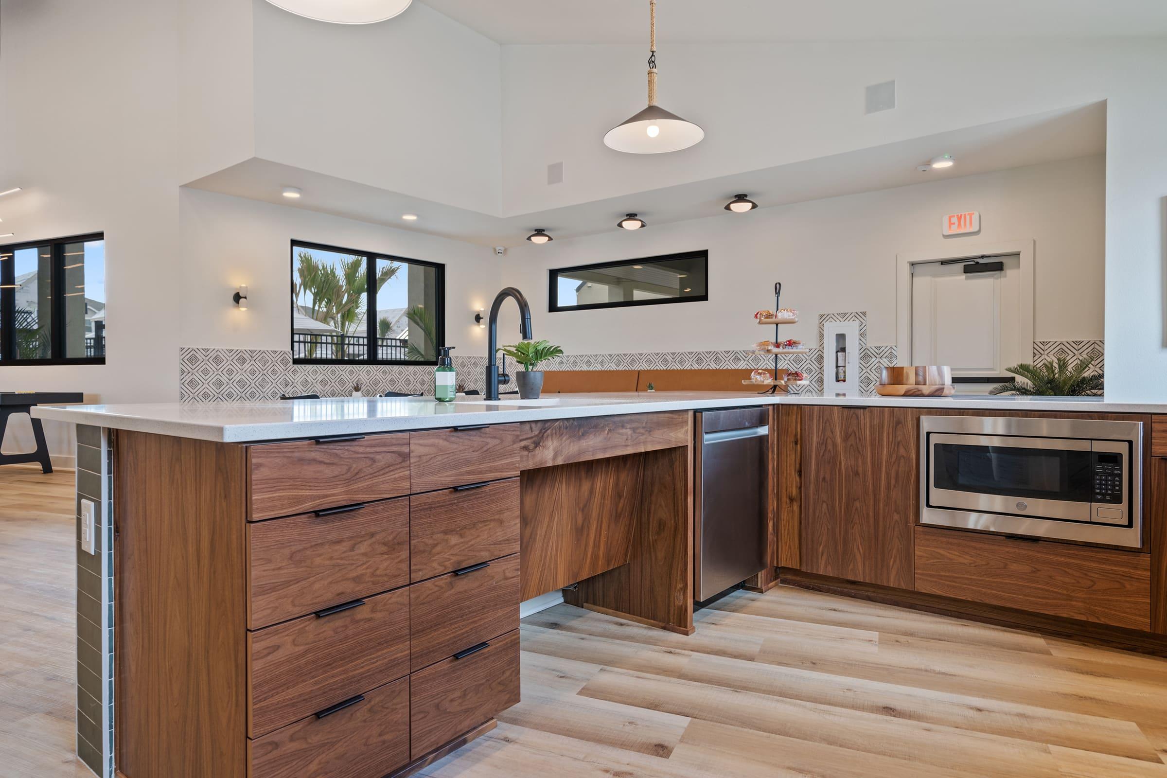 a modern kitchen with wood cabinets