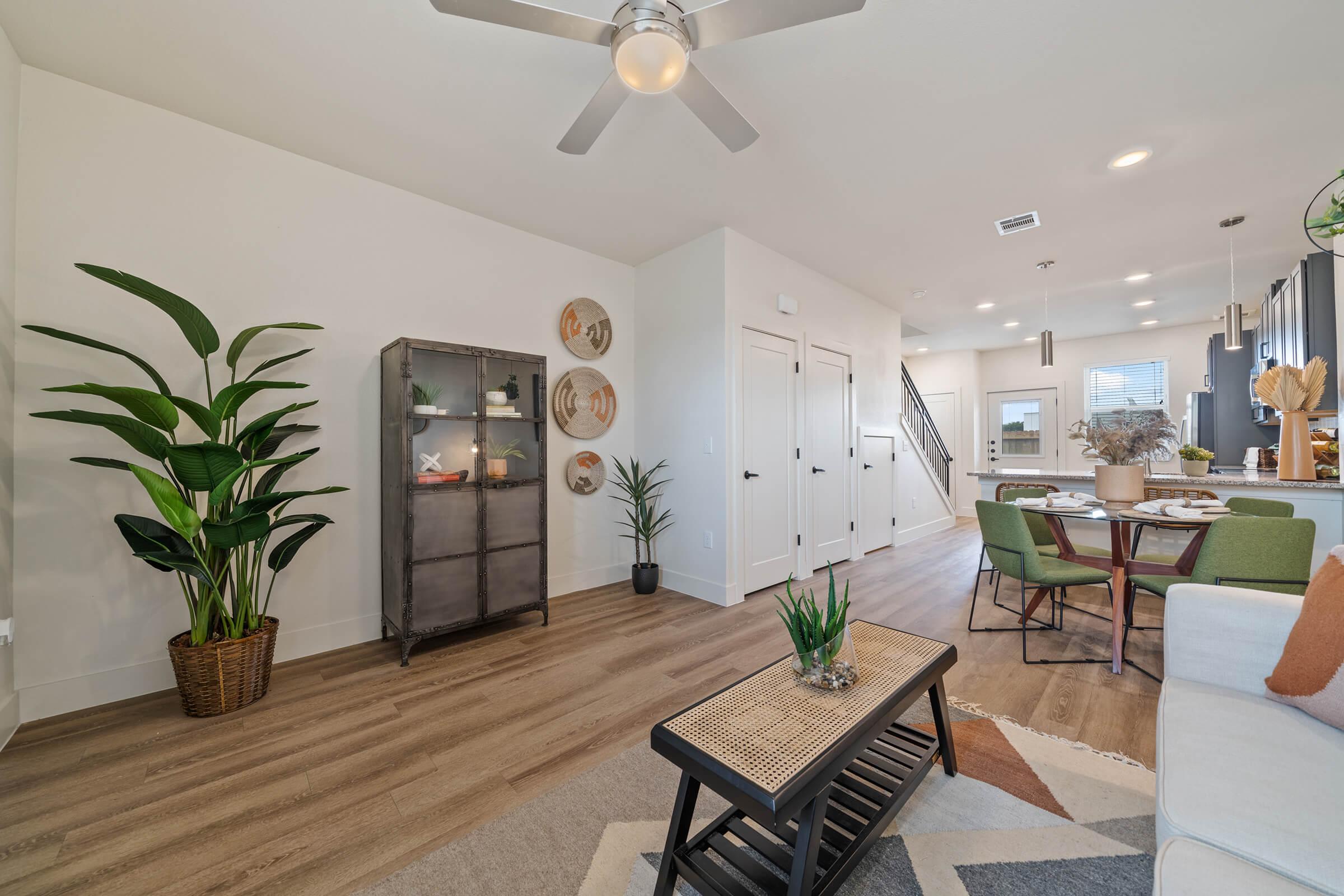 a living room filled with furniture and a fireplace