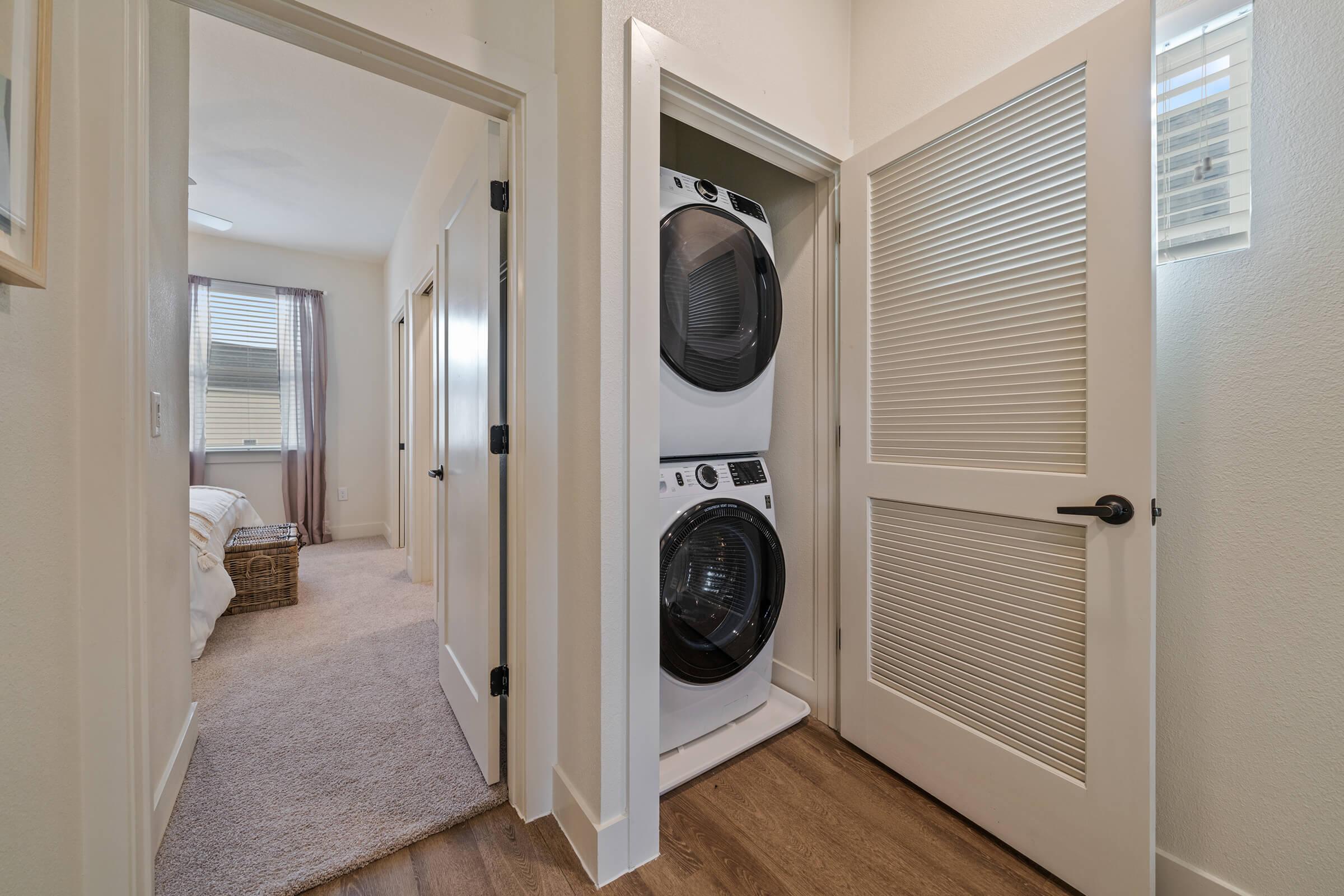 a room with a sink and a microwave