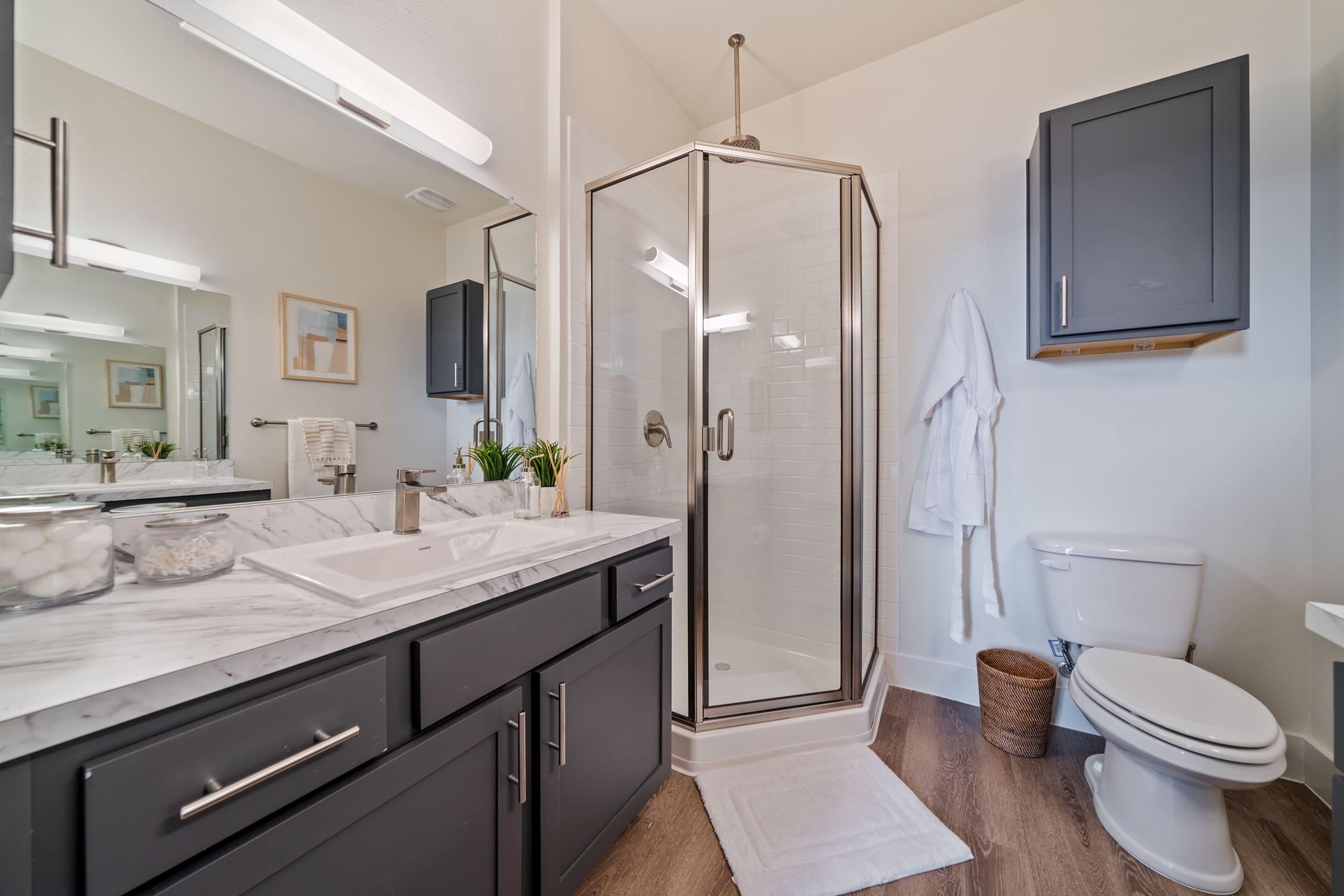 a kitchen with a sink and a mirror