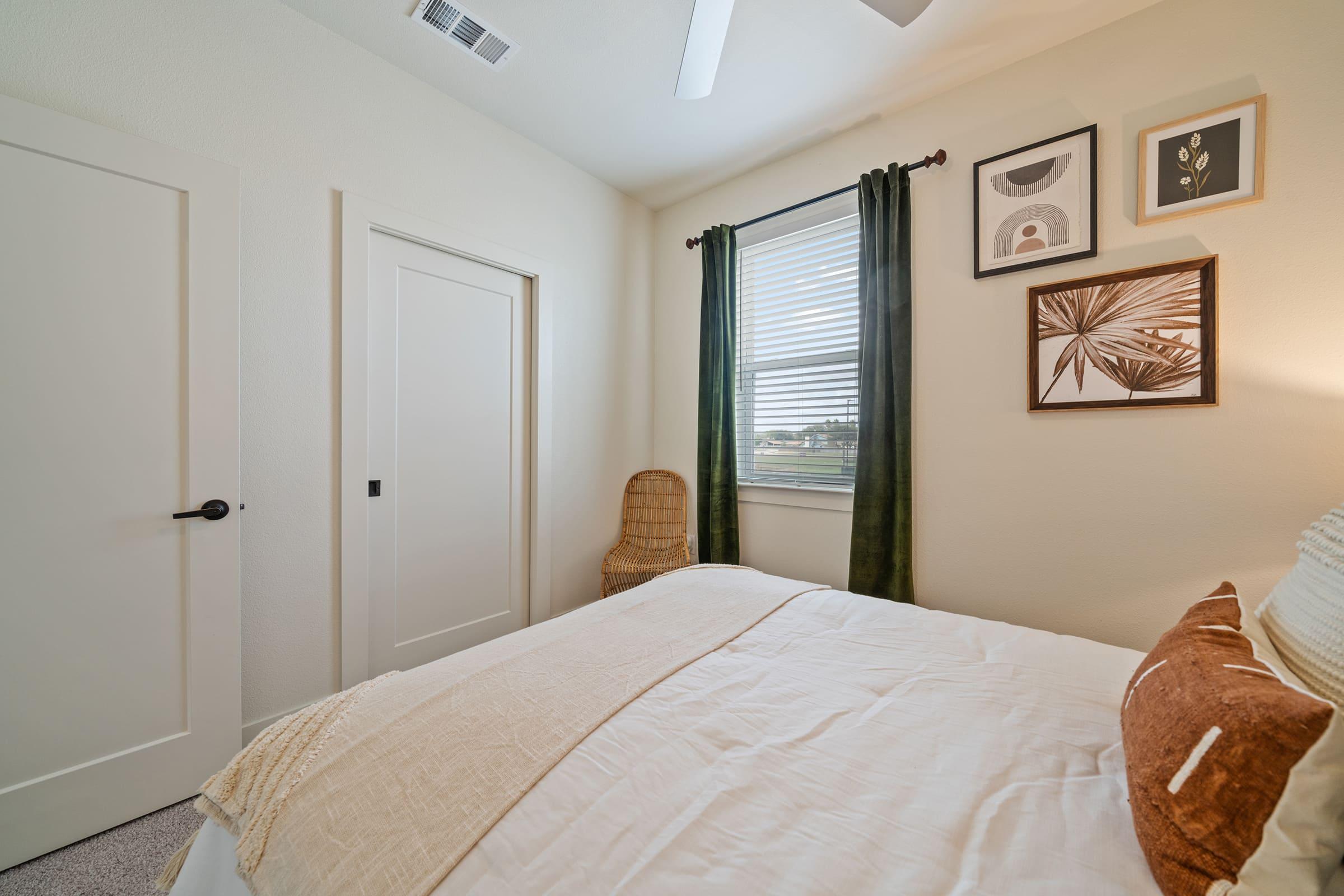 a bedroom with a bed in a hotel room