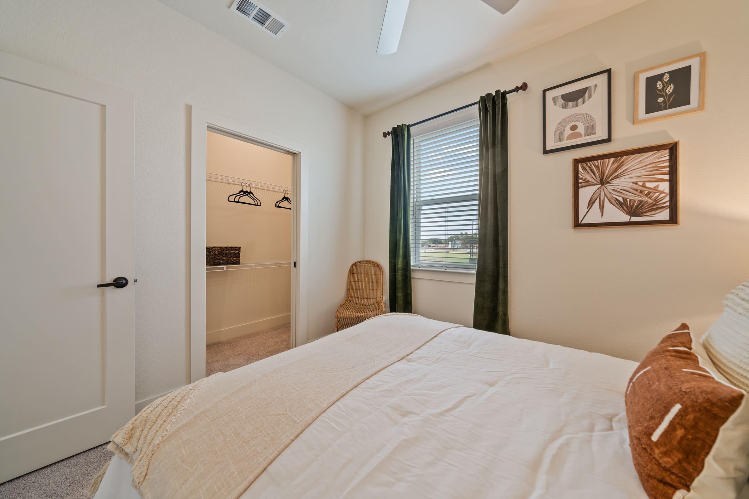 a bedroom with a bed in a hotel room