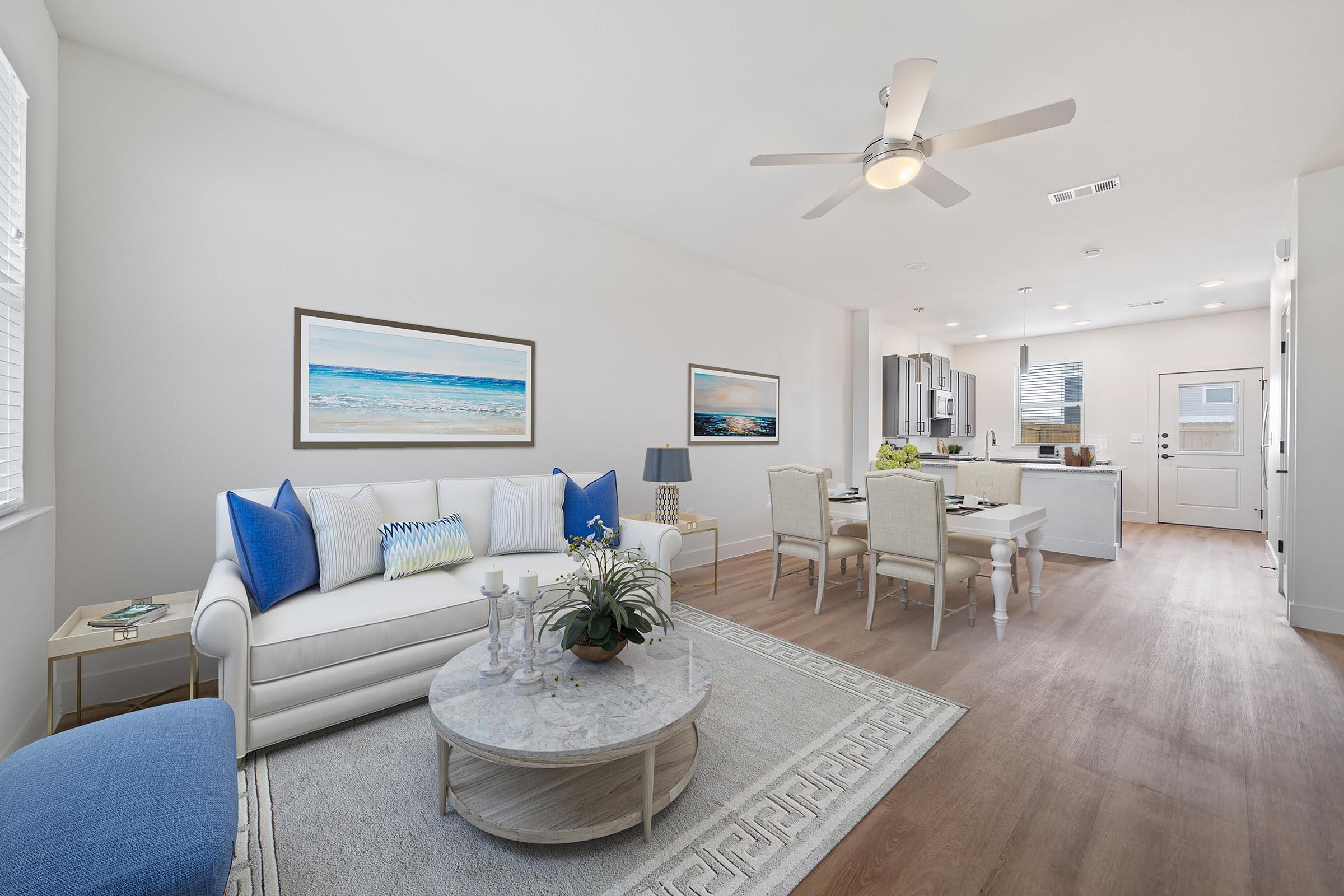 a living room filled with furniture and decor