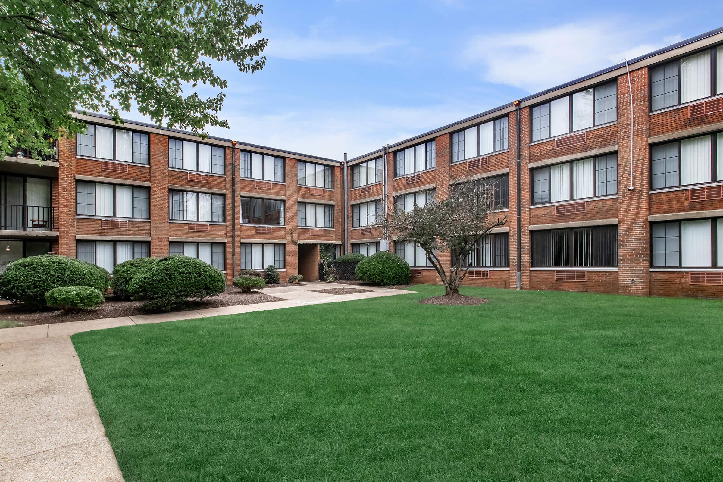 a large lawn in front of a building