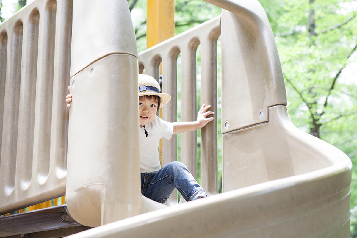 Boy playing on slide.jpg