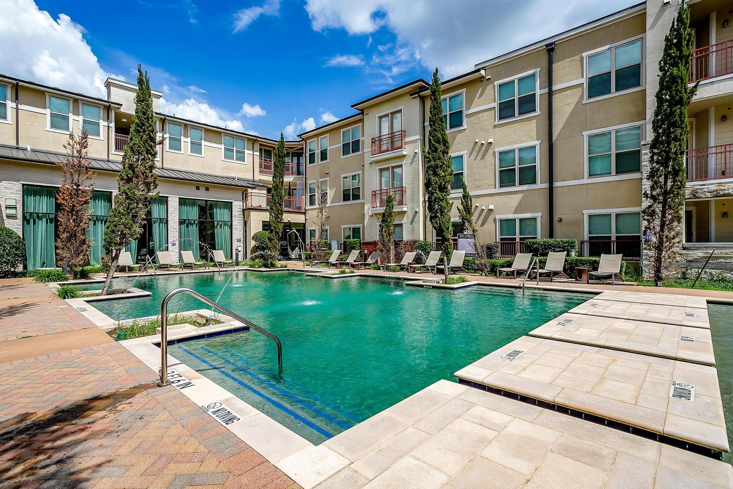 a pool of water in front of a building