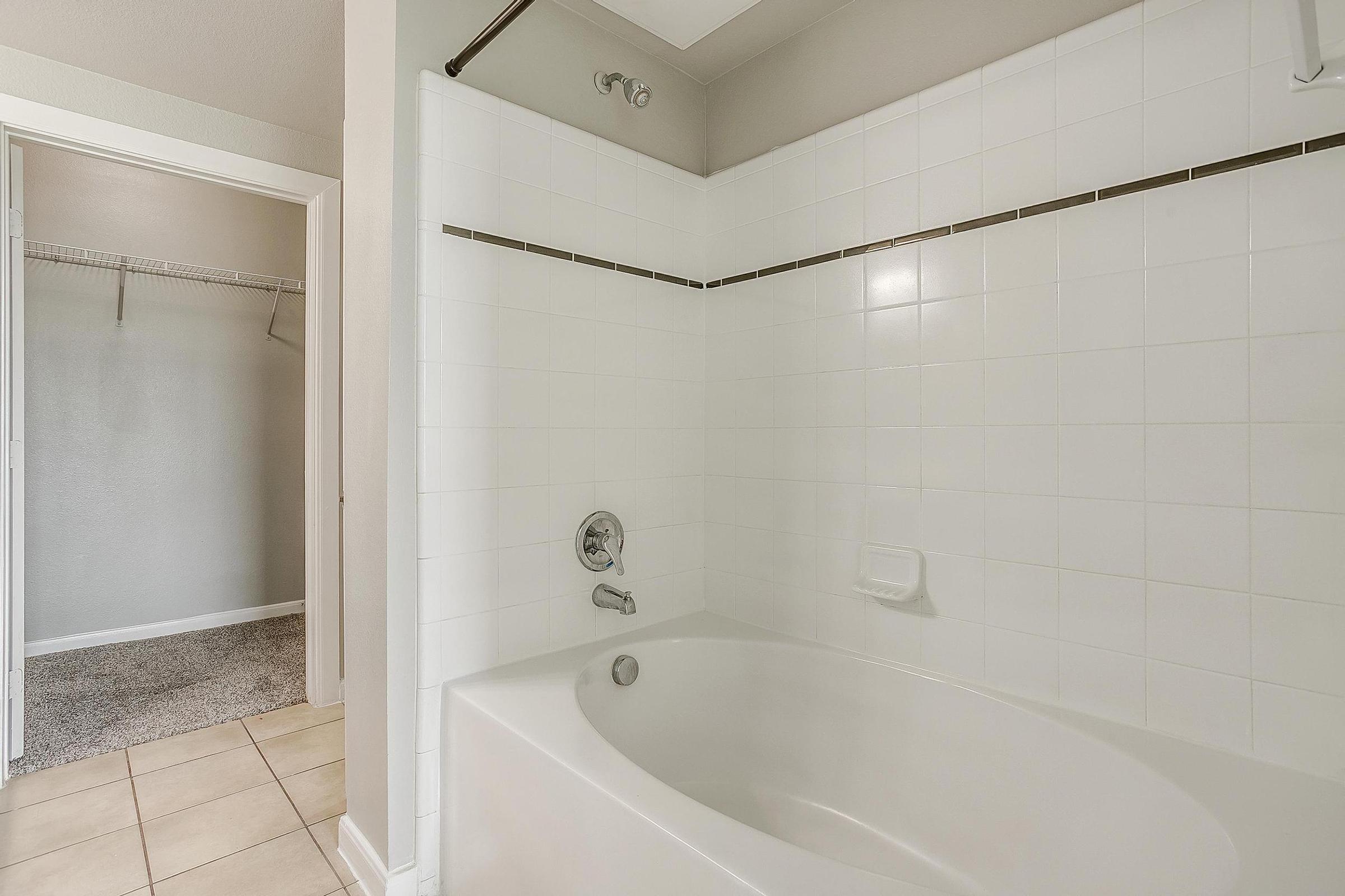 a close up of a sink and a bath tub