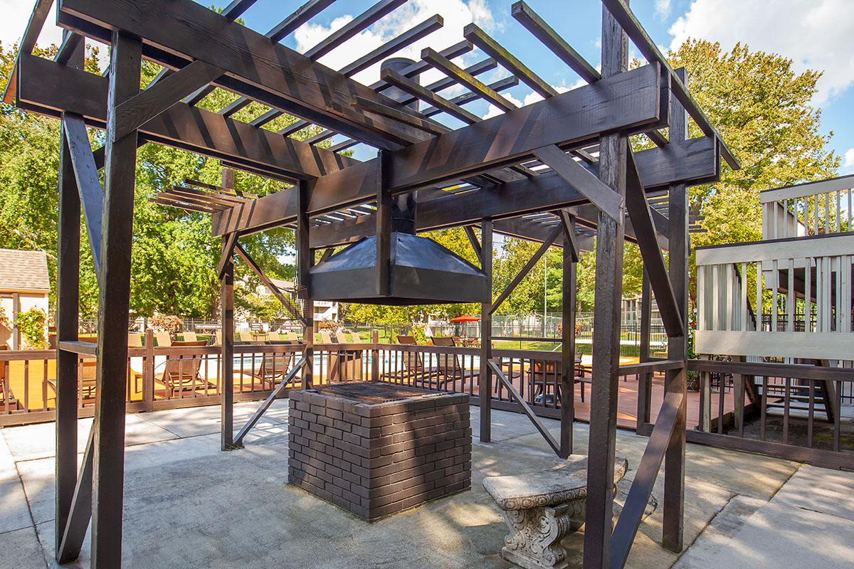 a wooden bench in front of a building