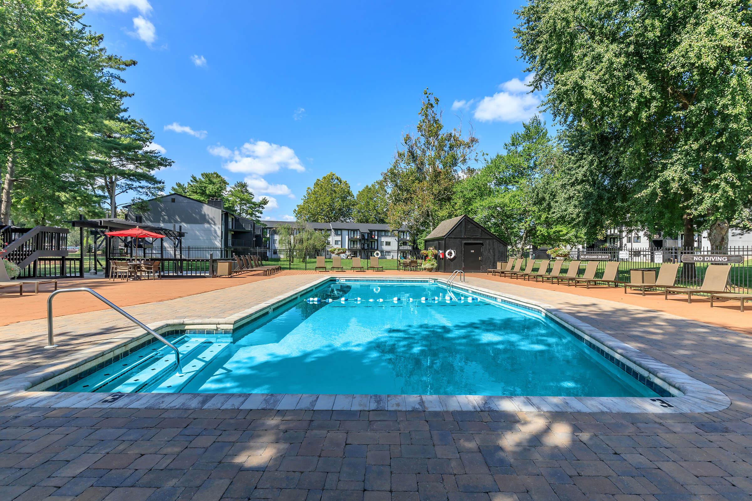 Soak up the Sun by the Shimmering Swimming Pool in Knoxville, TN