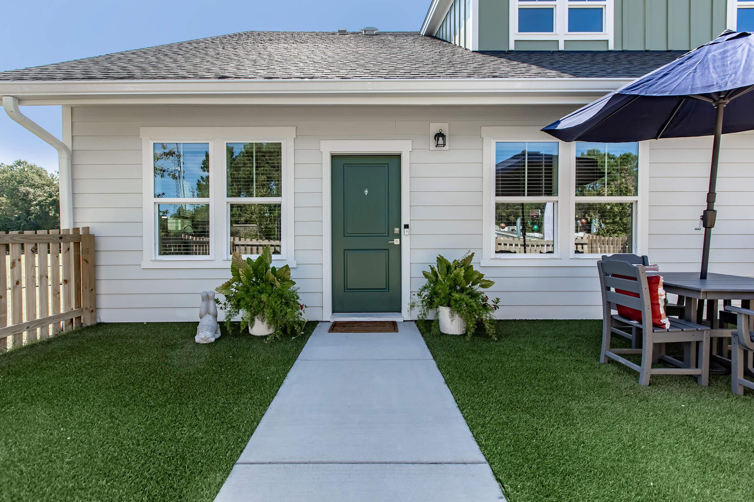 a large lawn in front of a house