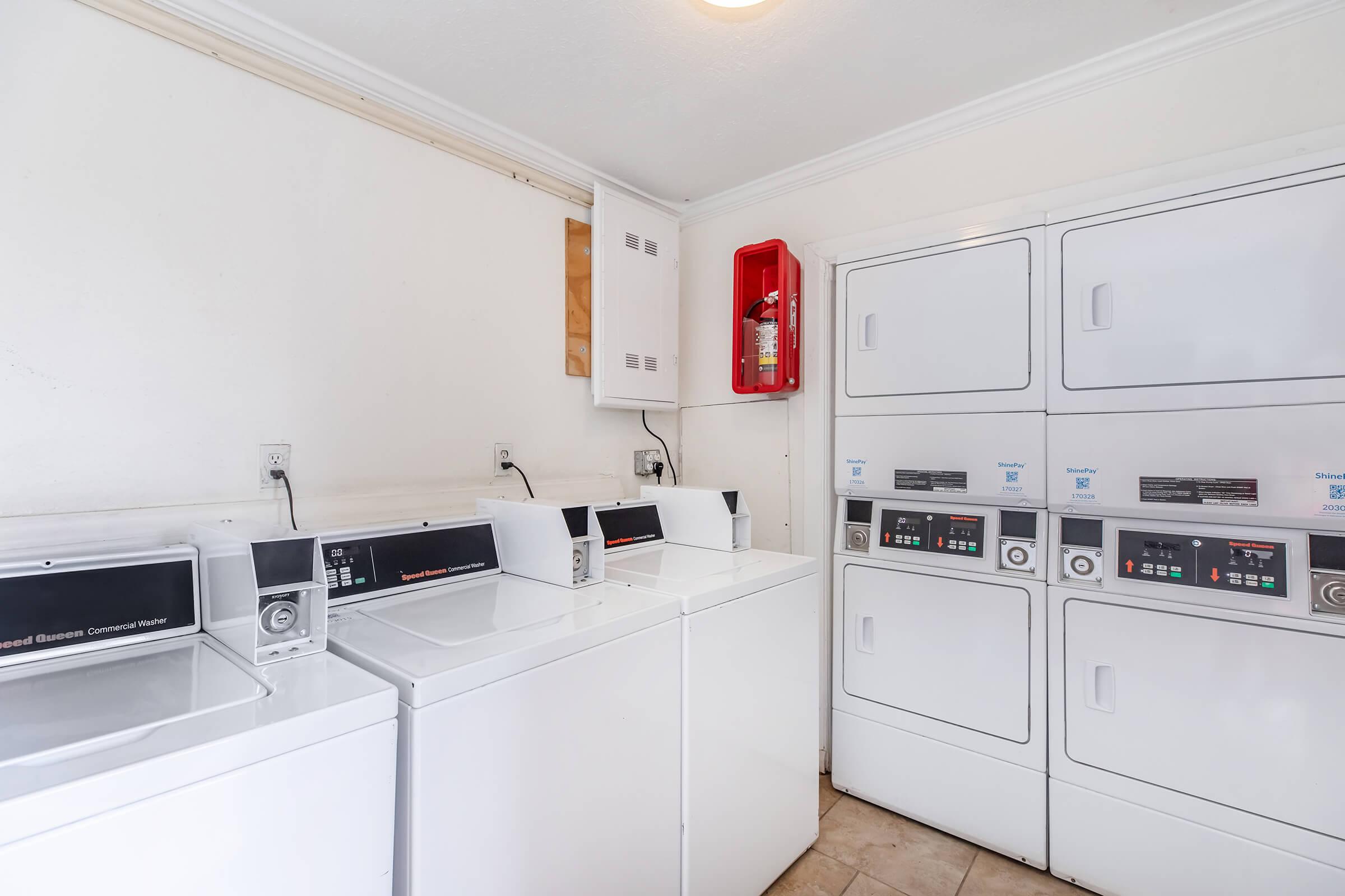 a kitchen with a sink and a microwave