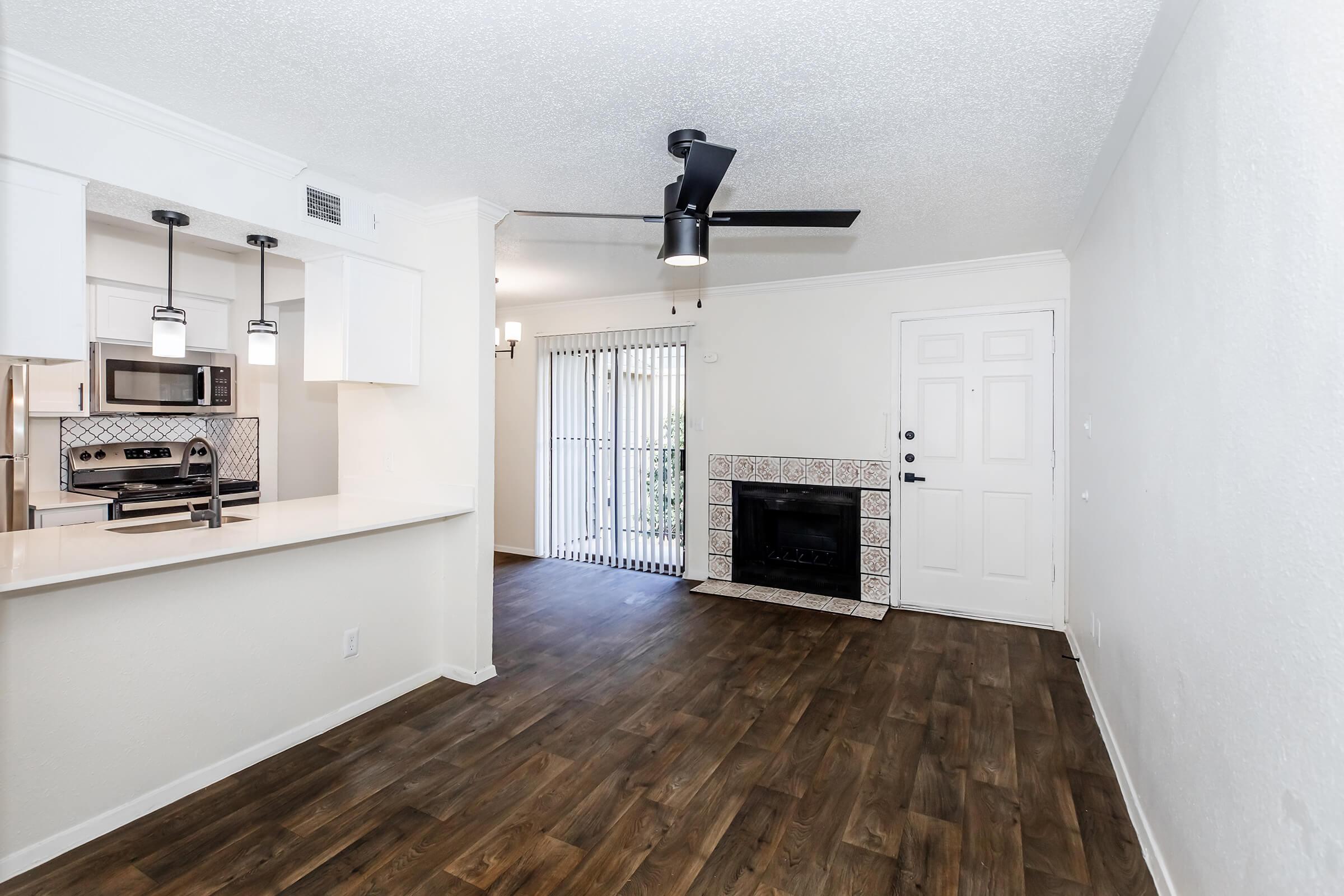 a kitchen with a wood floor