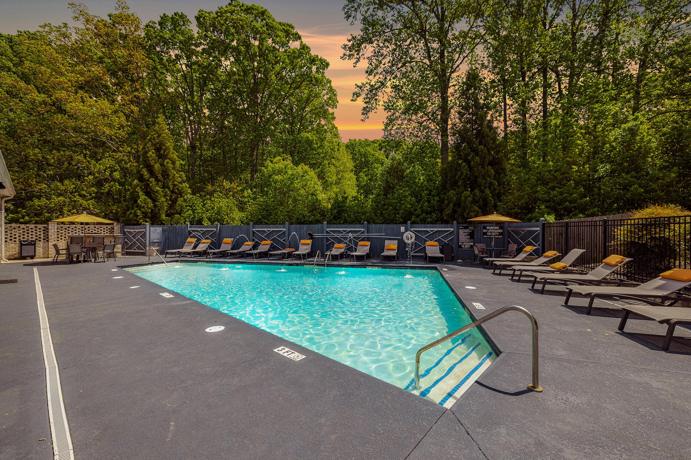 a pool next to a body of water