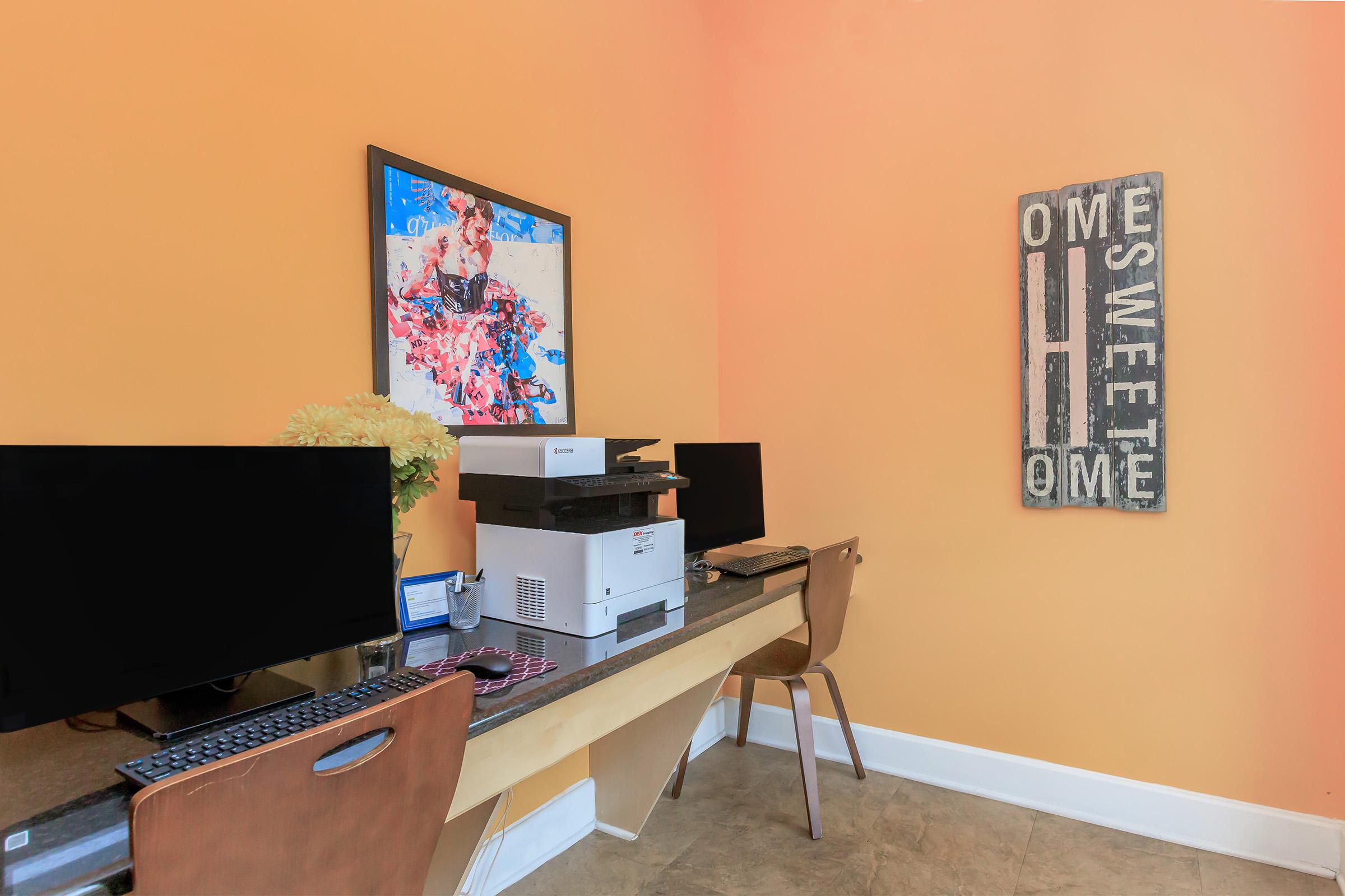 a flat screen tv sitting in a room