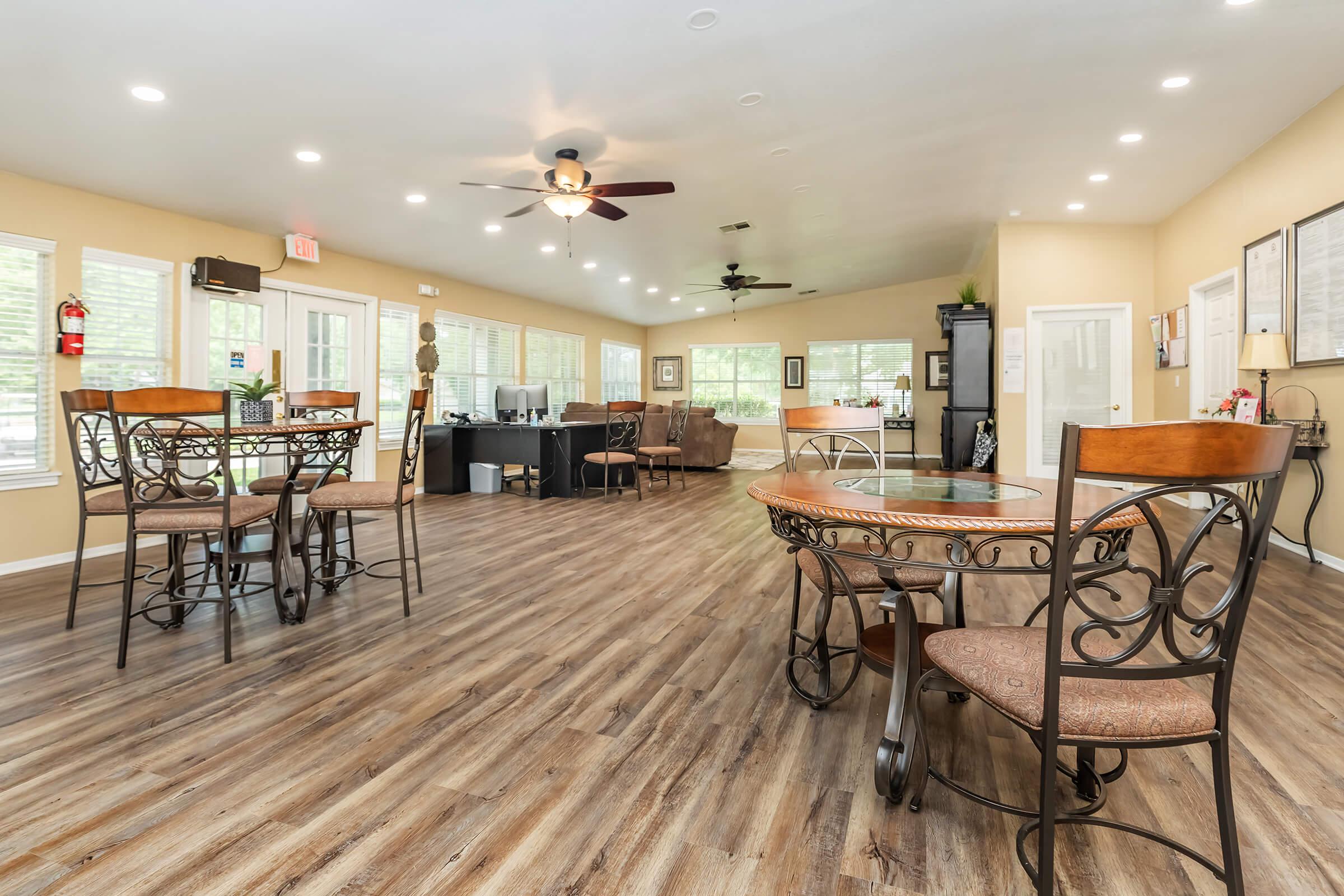 a room filled with furniture and a table