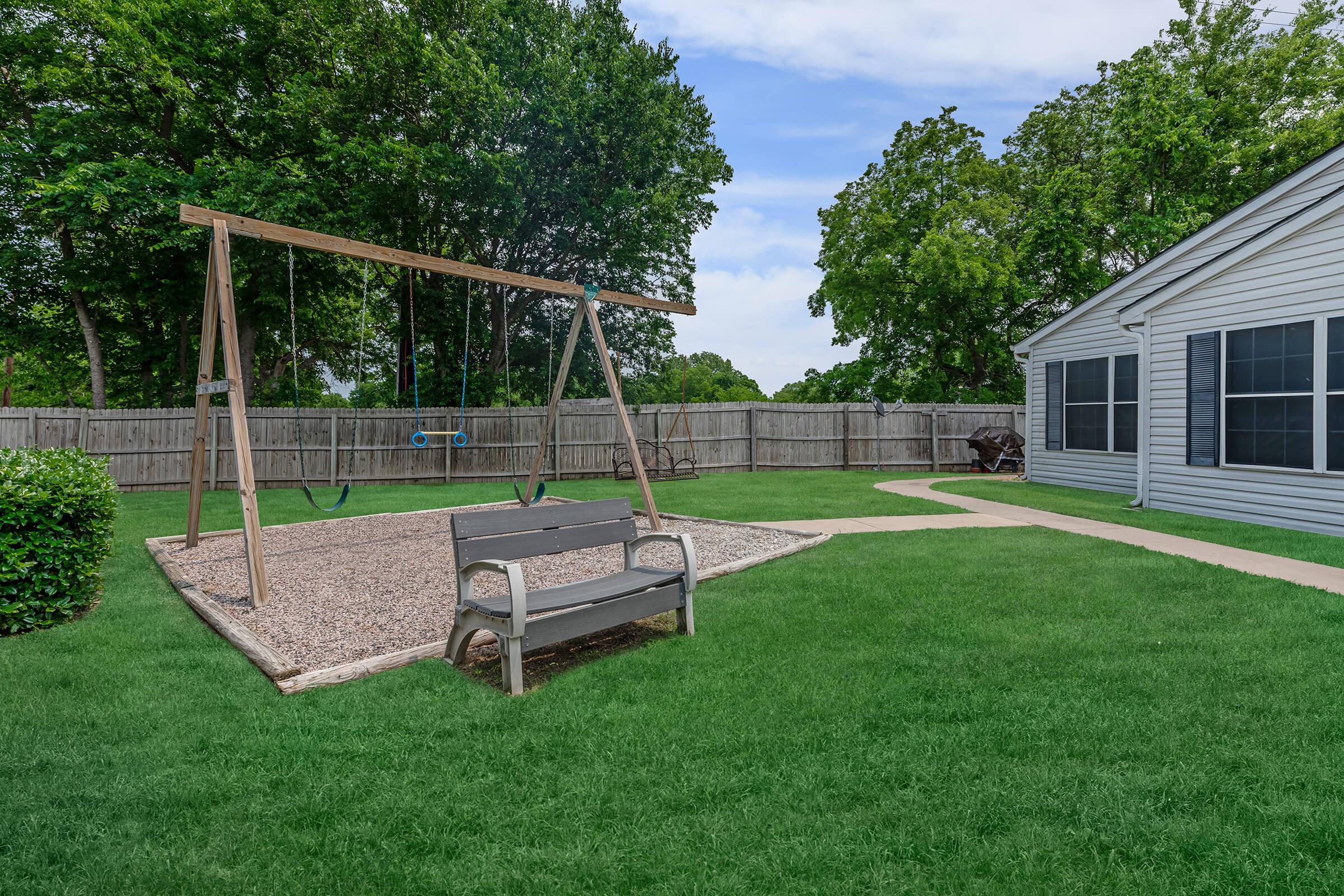 a large lawn in front of a house