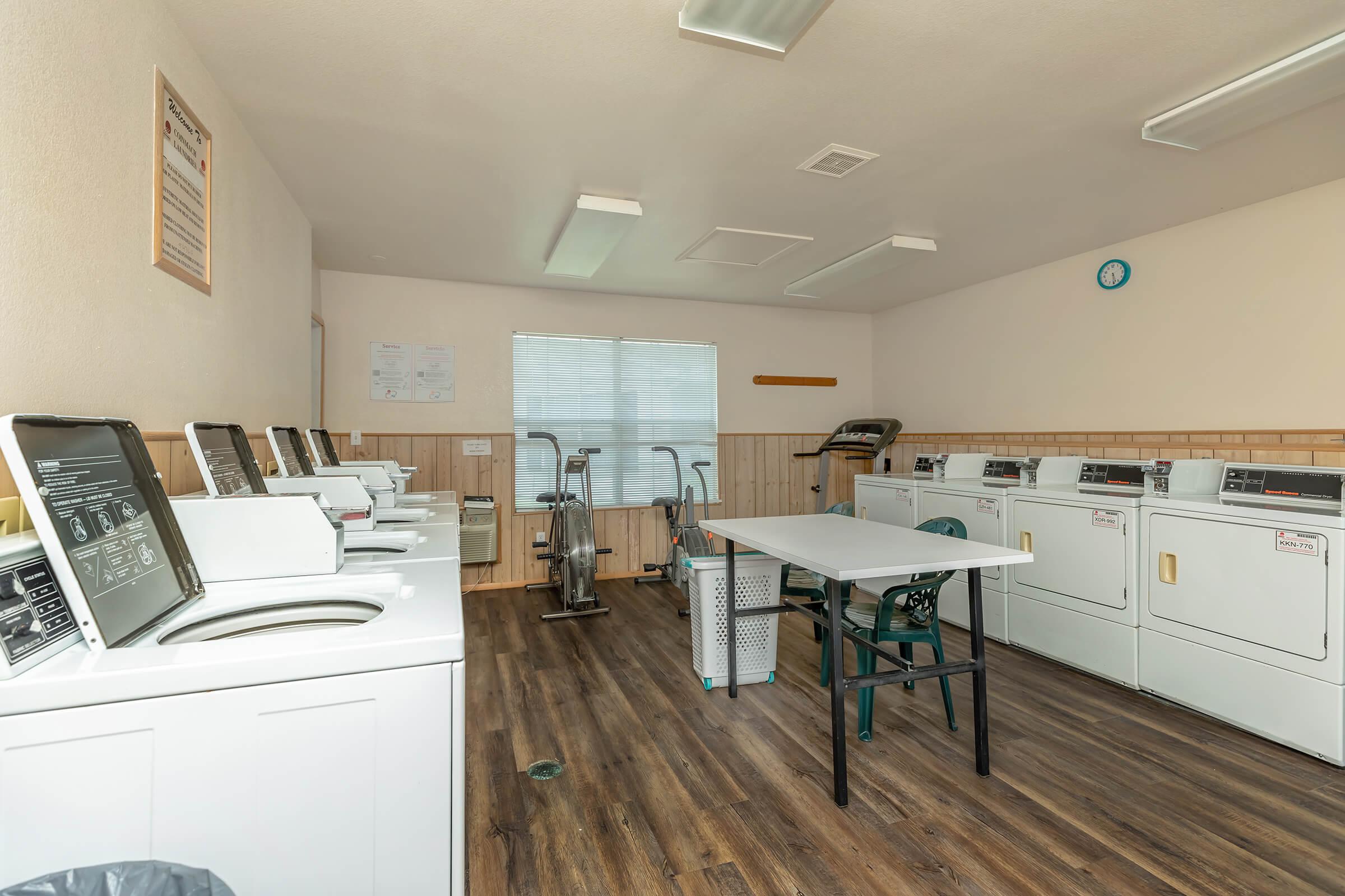 a kitchen with a table in a room