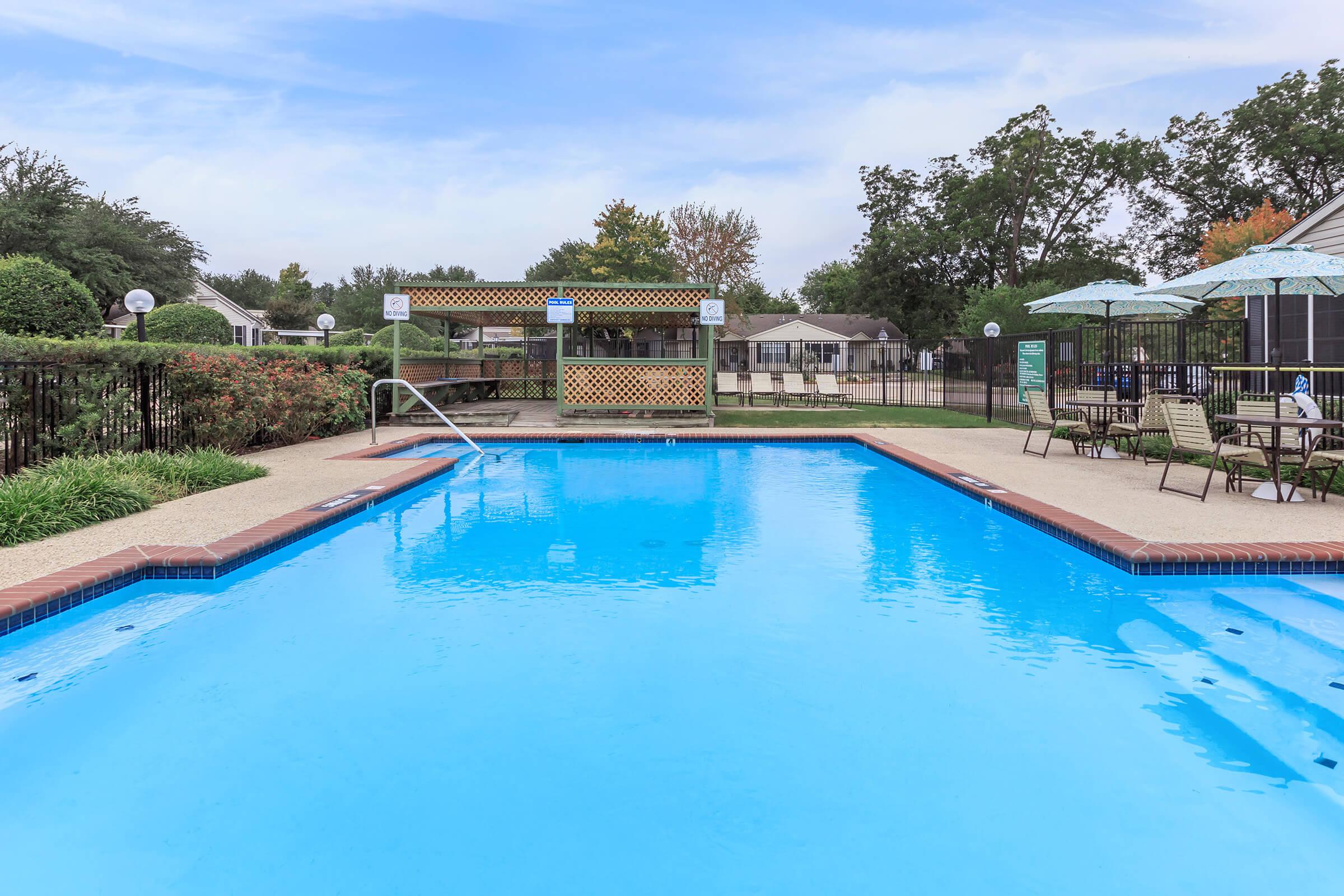a pool next to a body of water