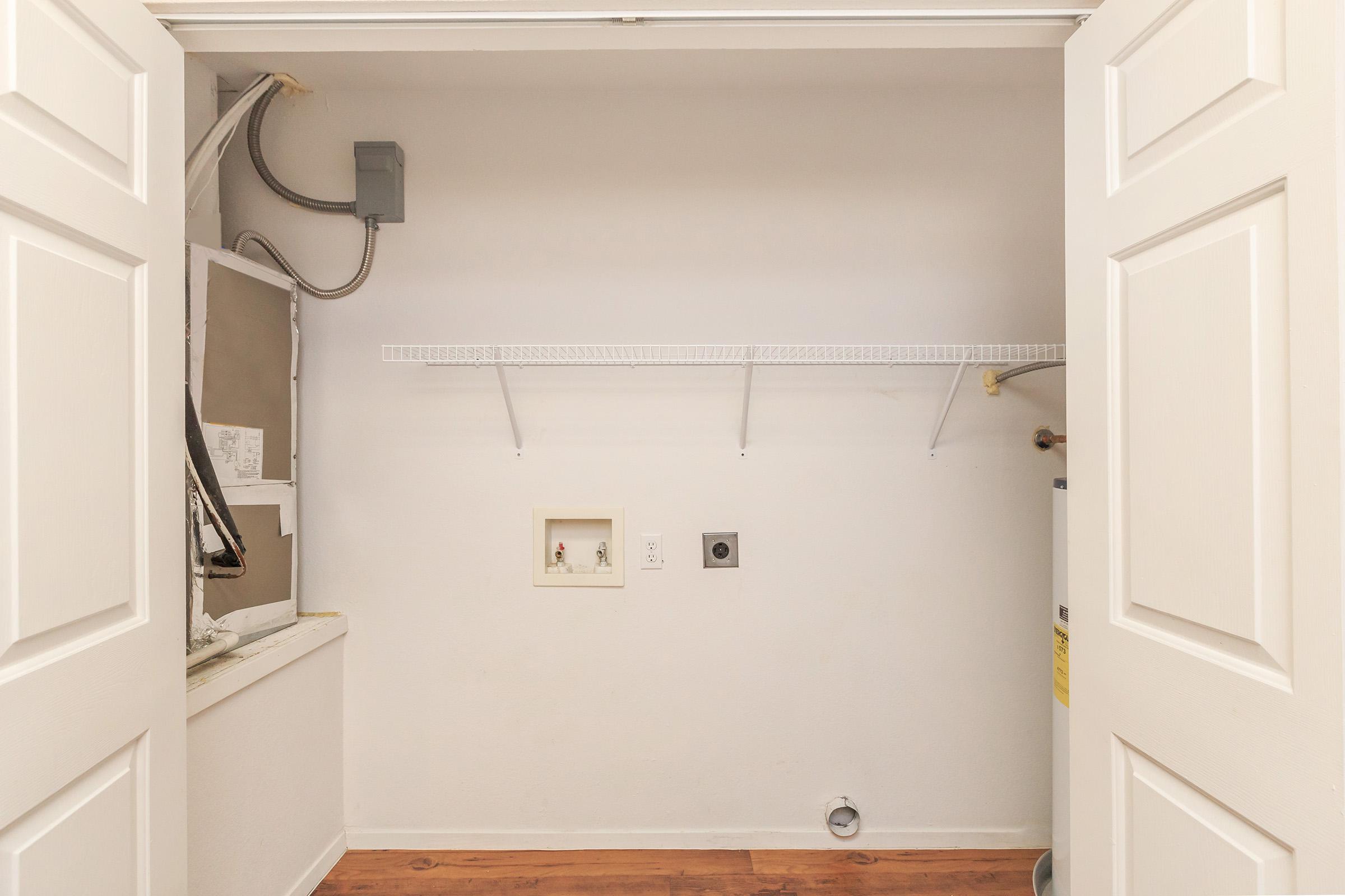 a white sink in a small room