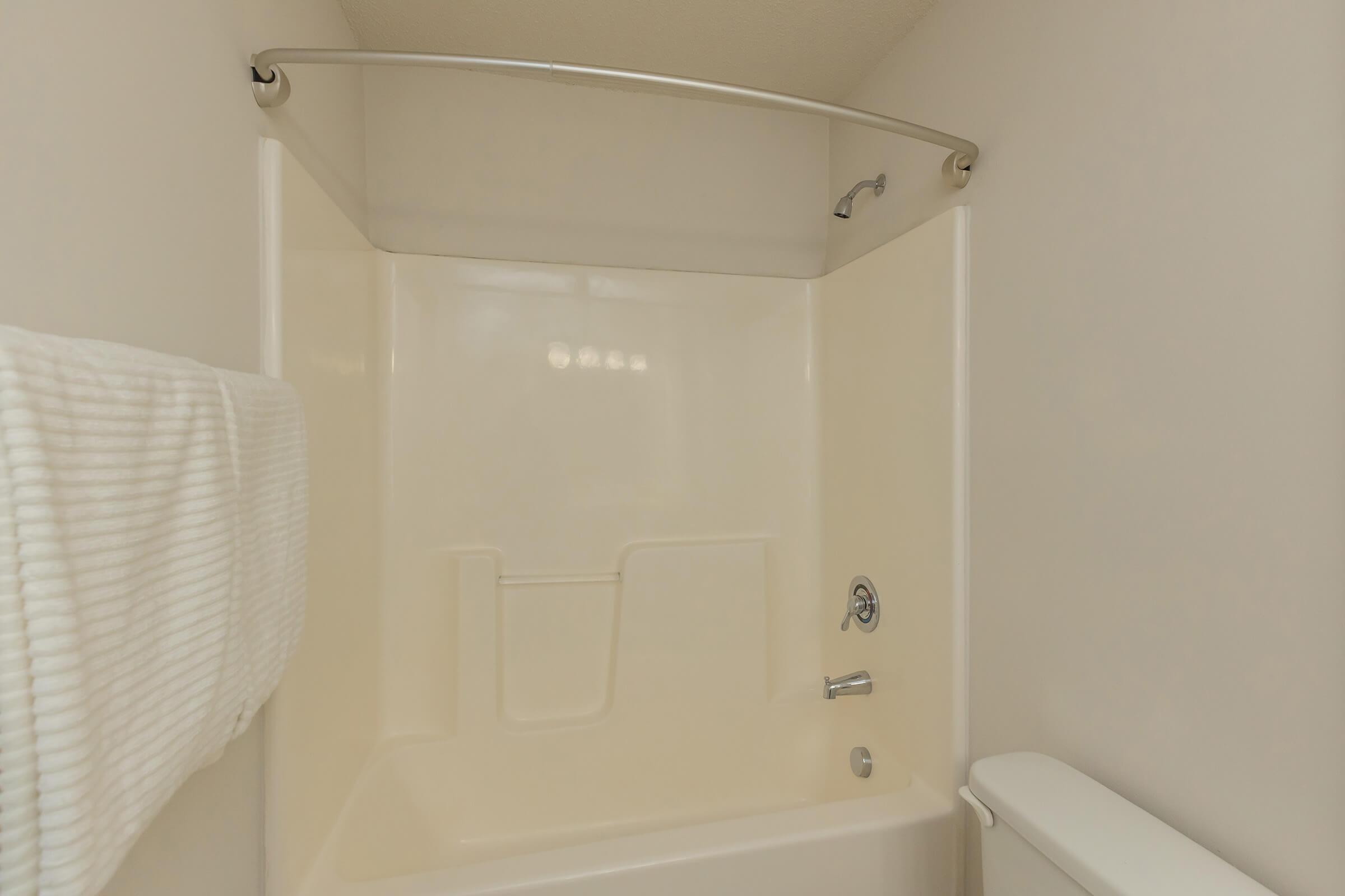 a shower curtain over the tub