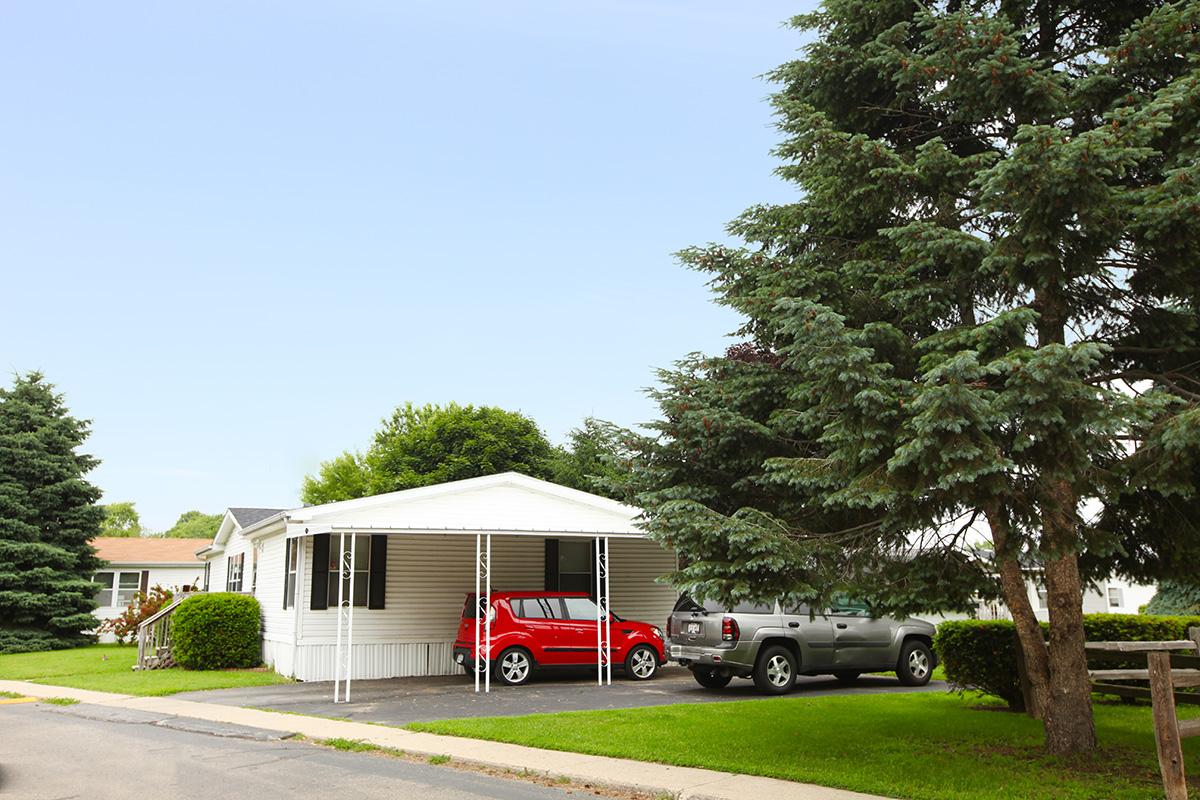 a truck is parked in front of a house