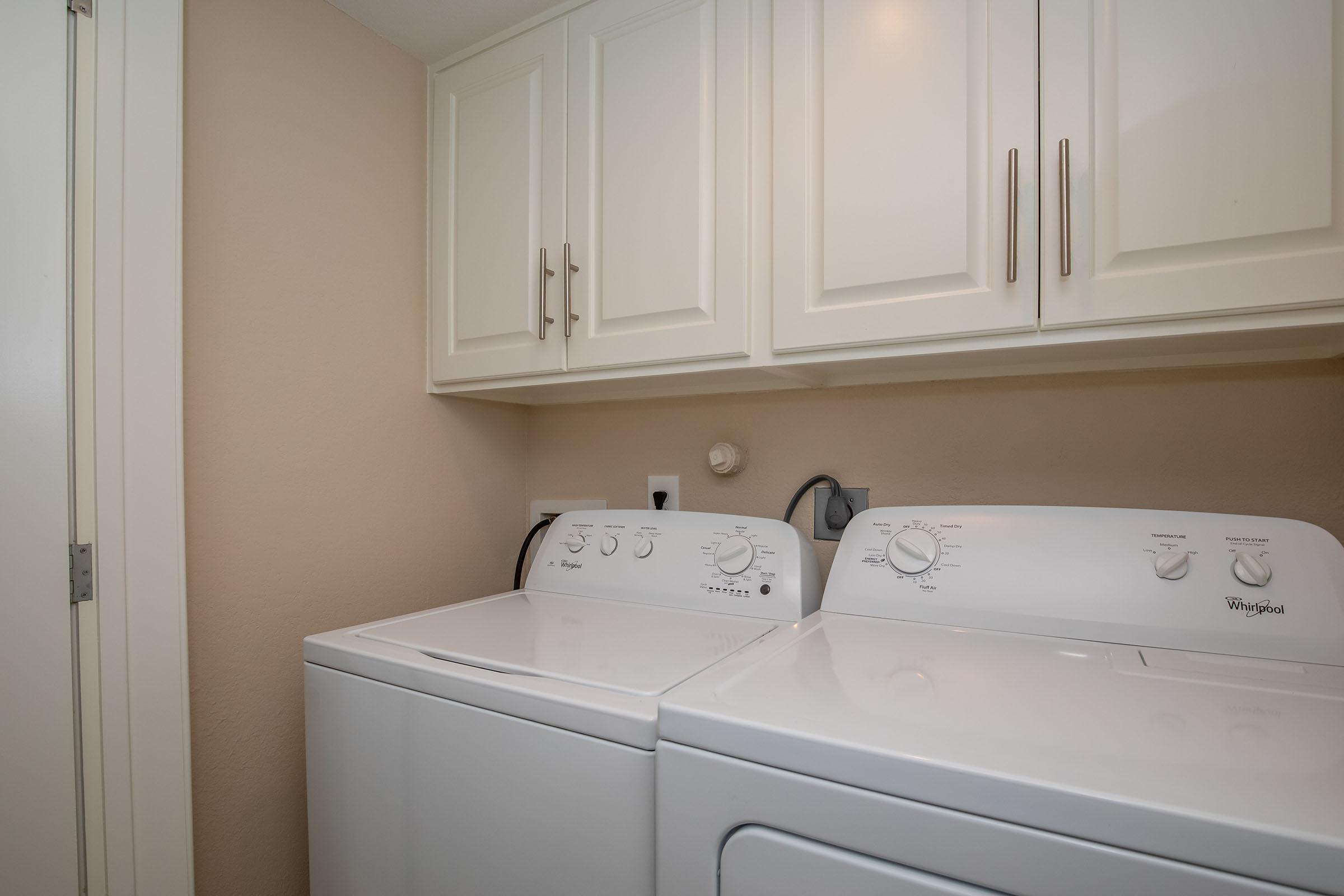 a kitchen with a sink and a microwave