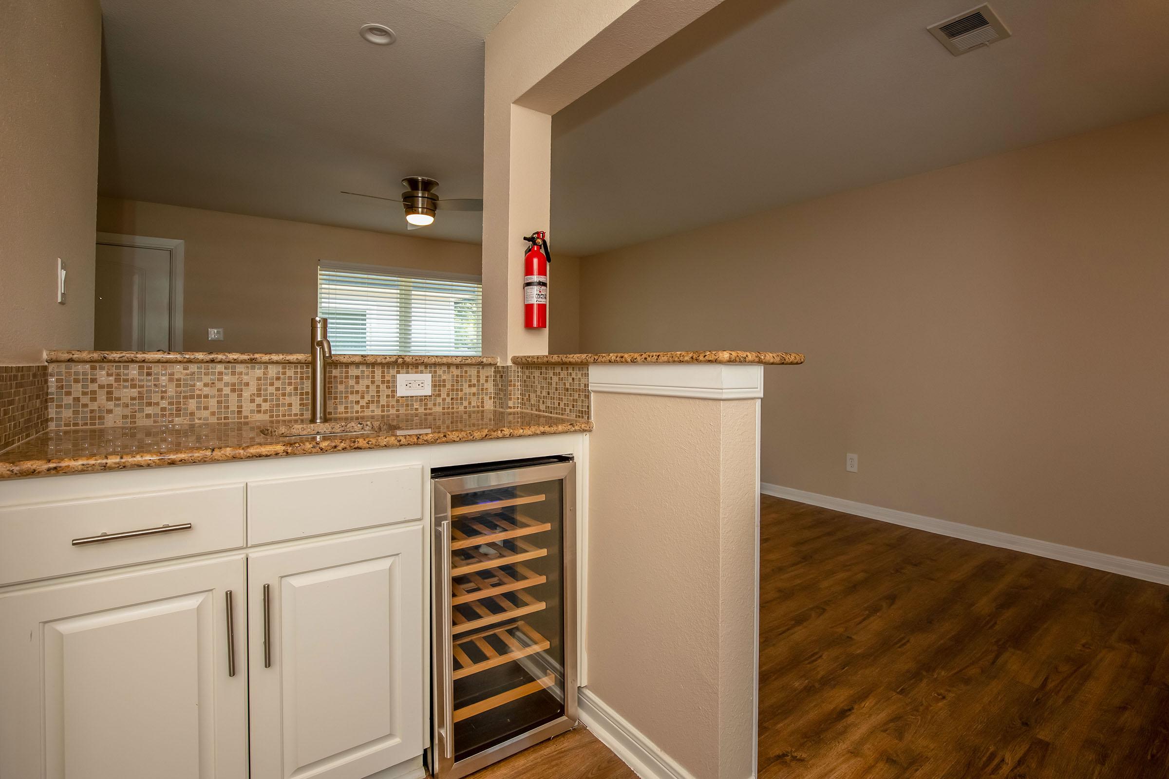 a stainless steel refrigerator in a kitchen