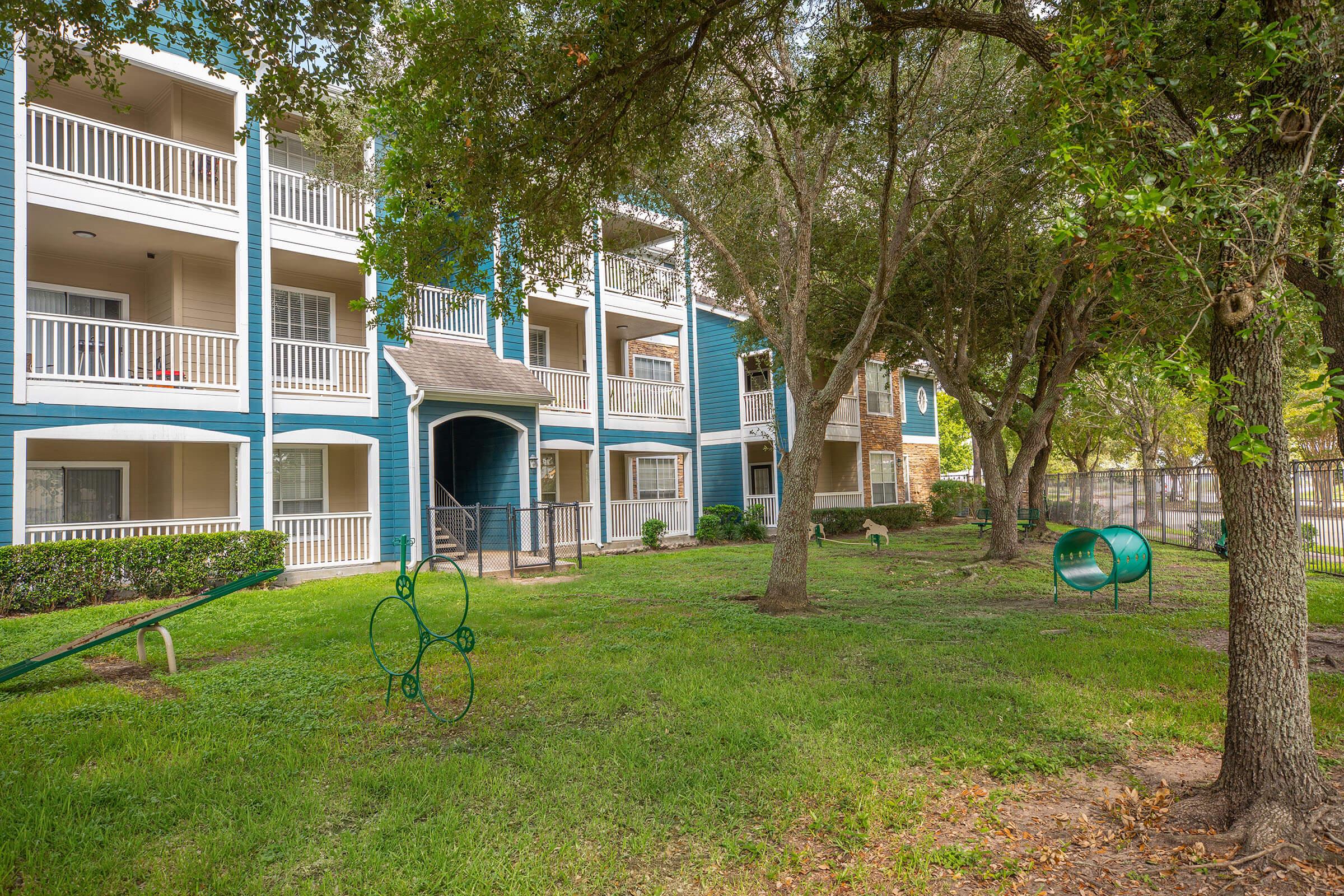 a large lawn in front of a house