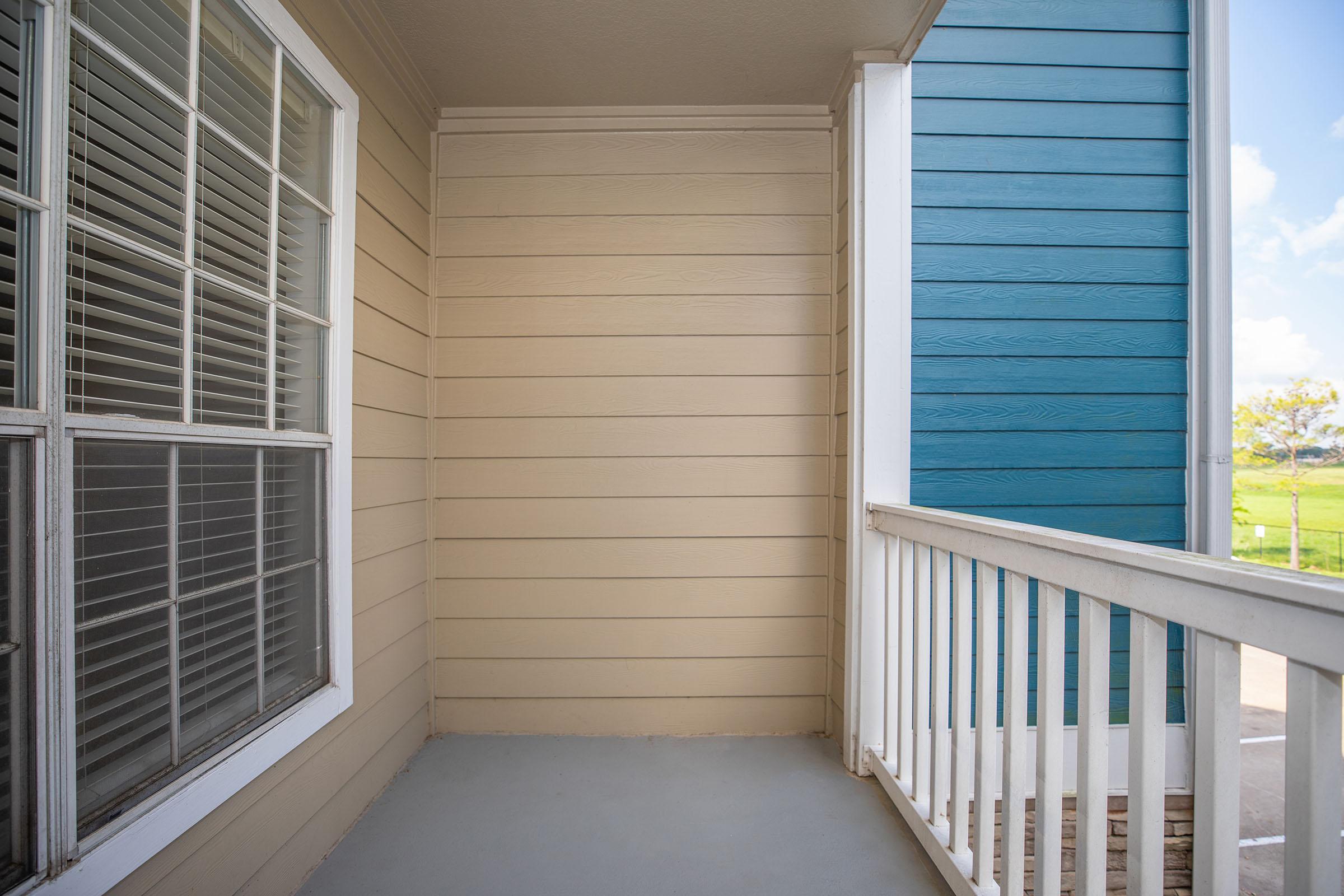 a bench in front of a window