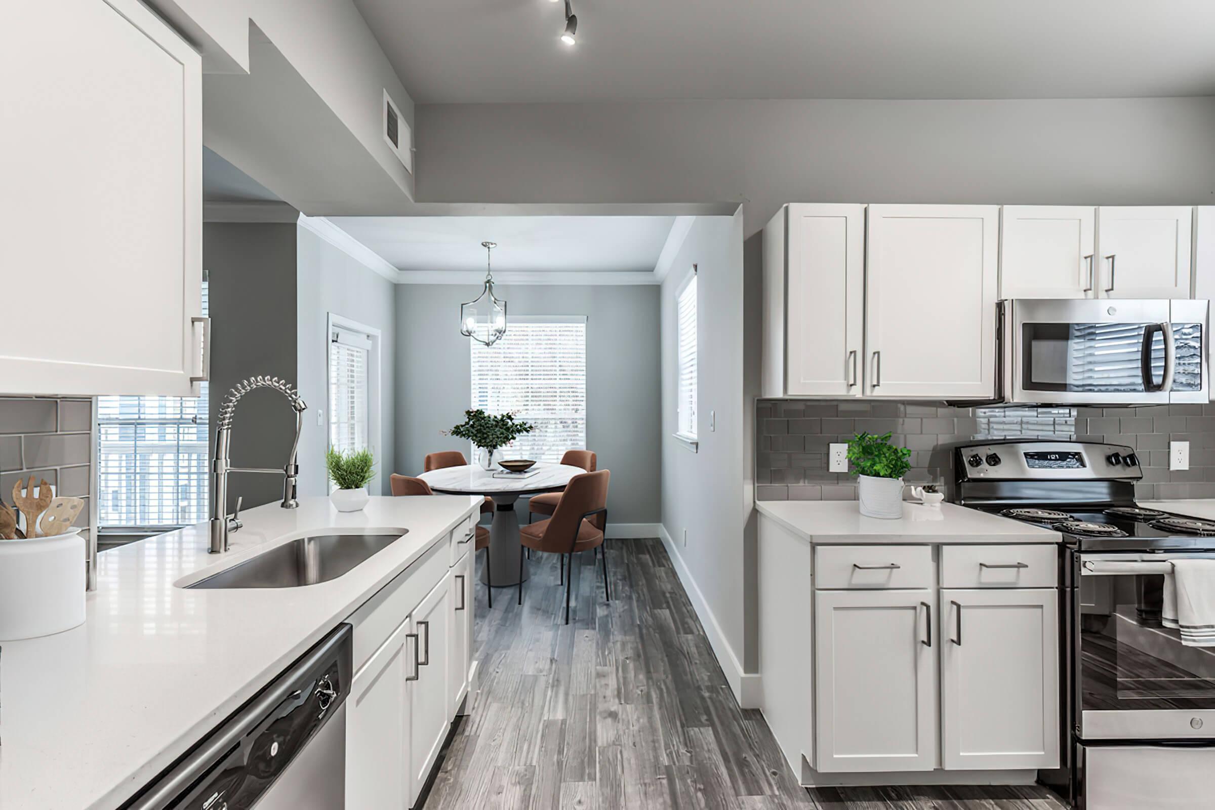 a kitchen with a sink and a window