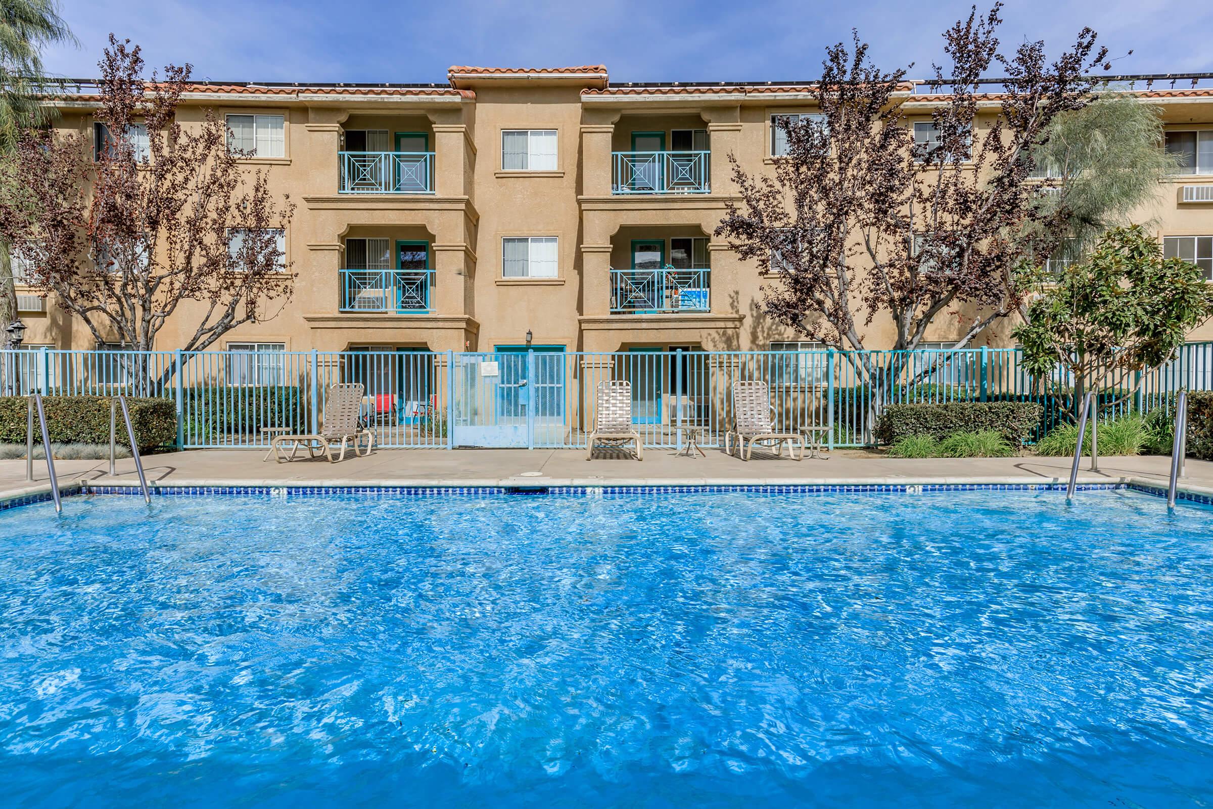 a large pool of water in front of a building