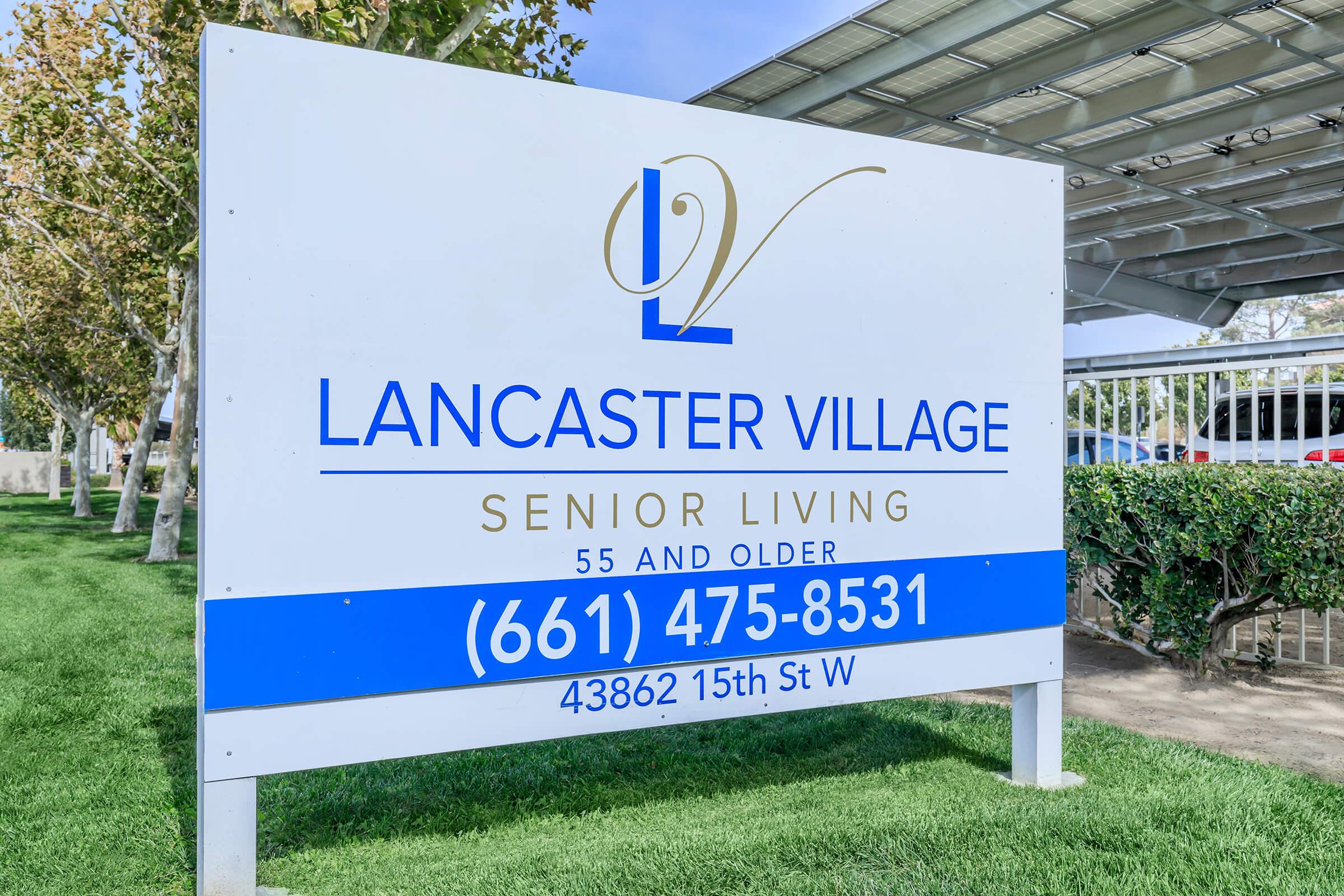 a sign in front of a house