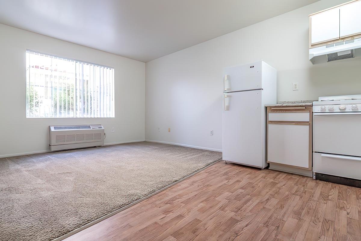 a kitchen with a wooden floor