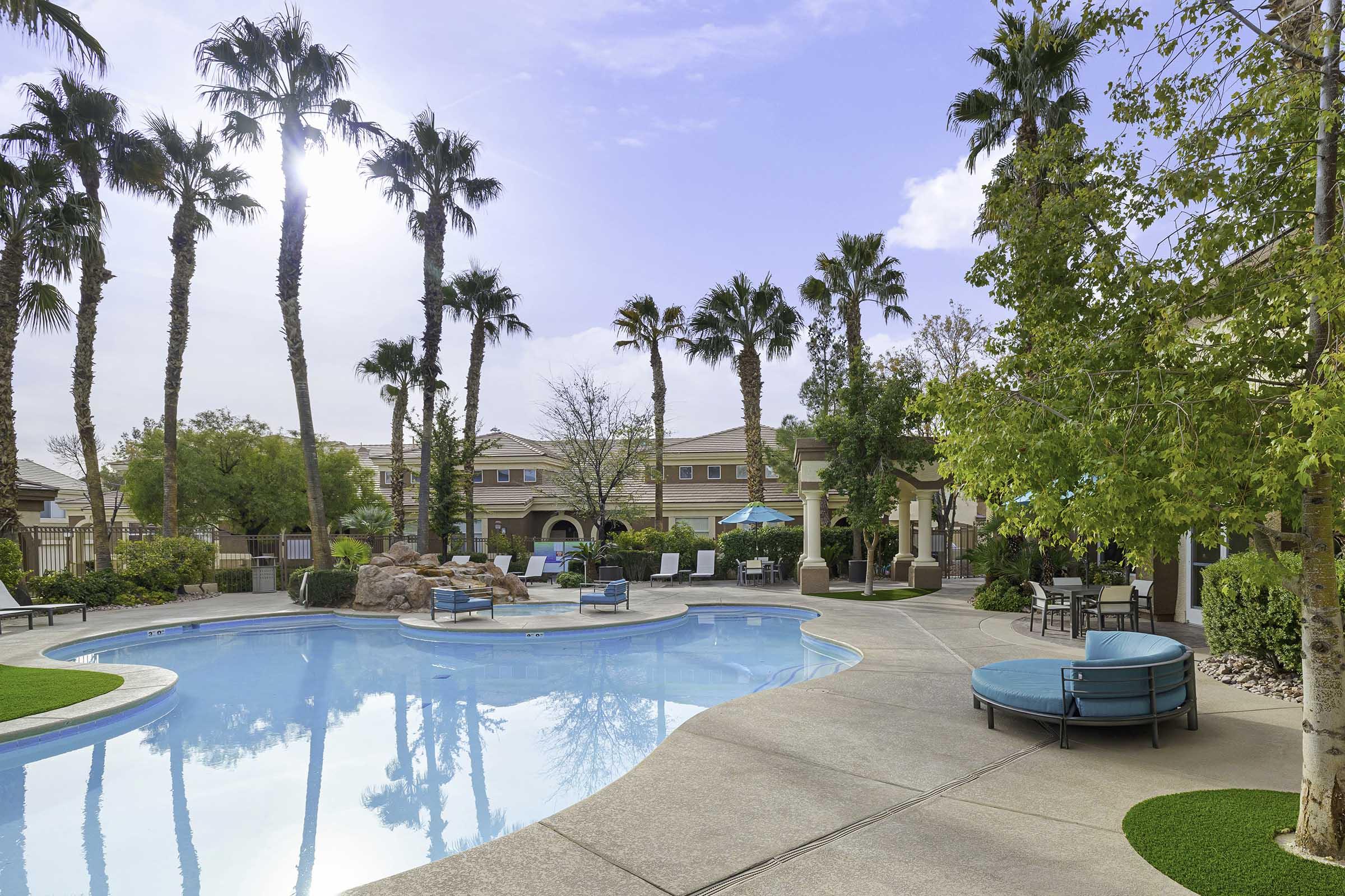 lounge chair next to pool