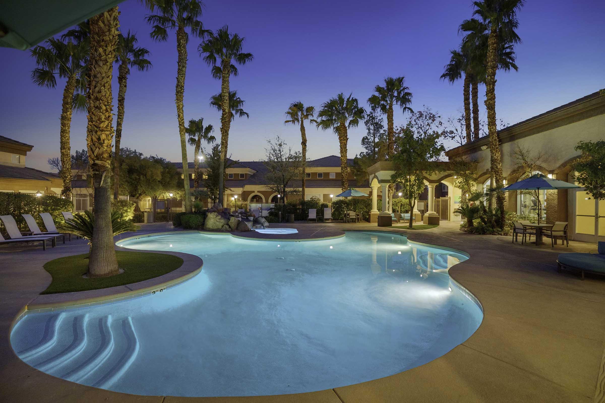 dusk view of swimming pool