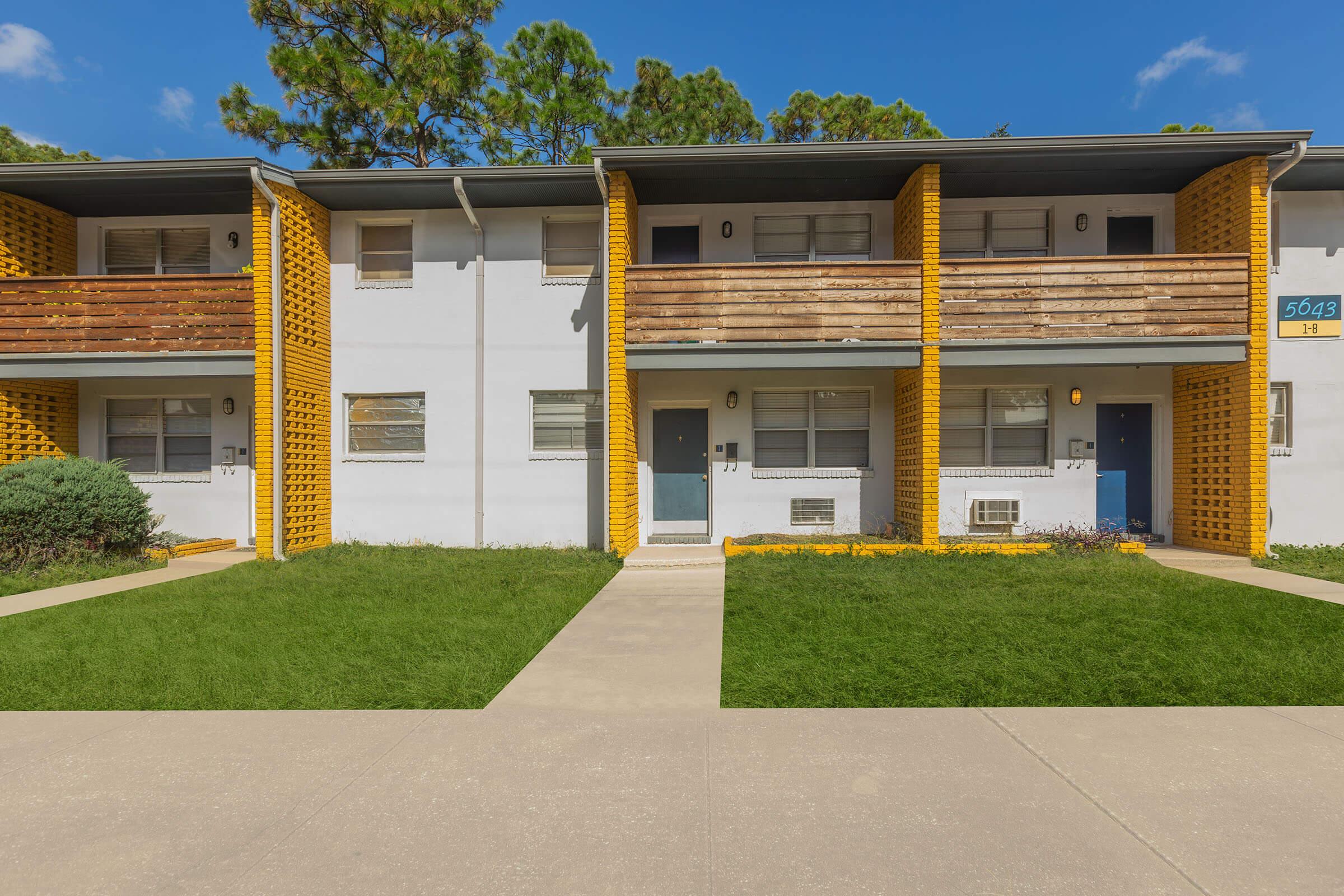 a house that is parked on the side of a building