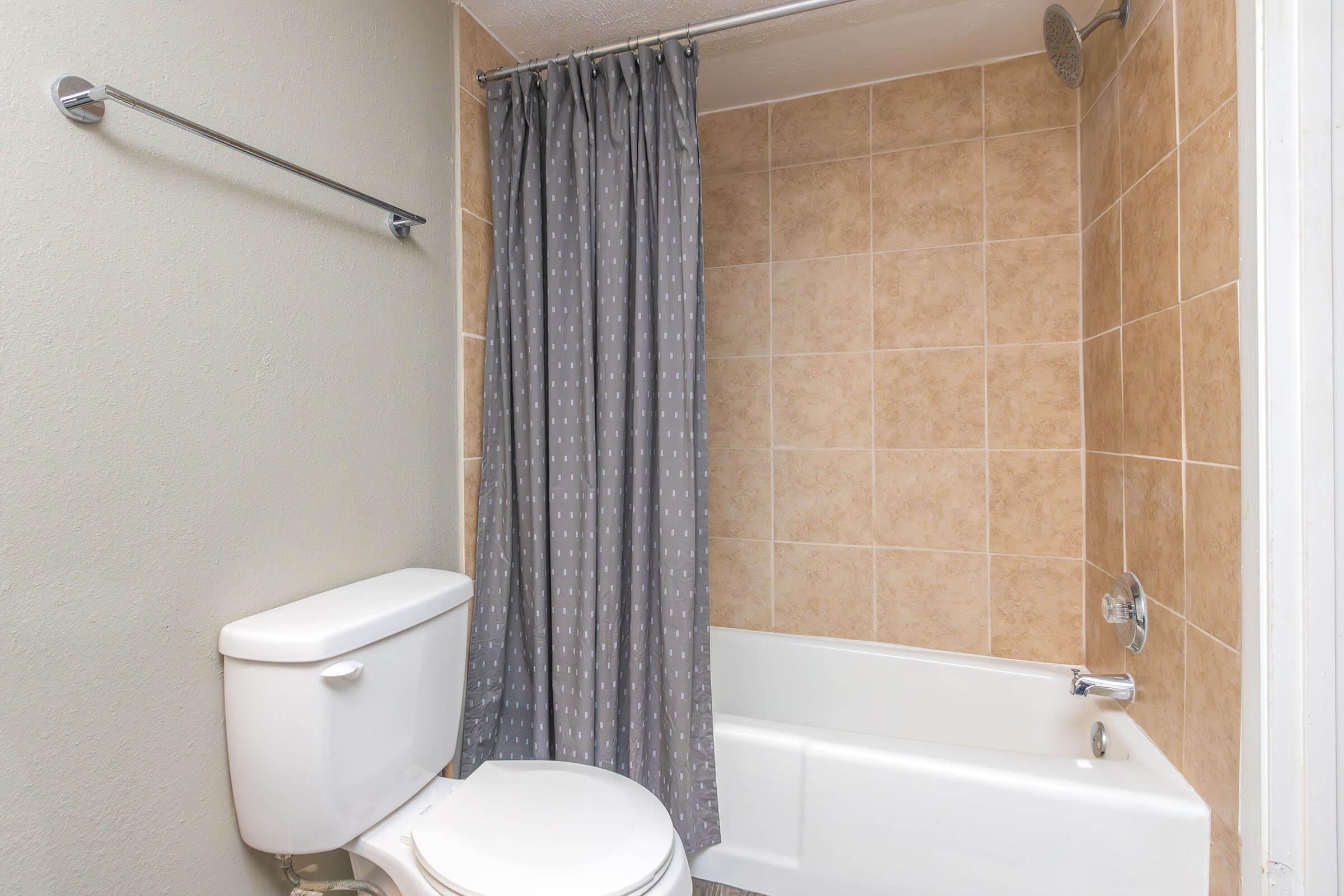 a rest room with a sink and a mirror