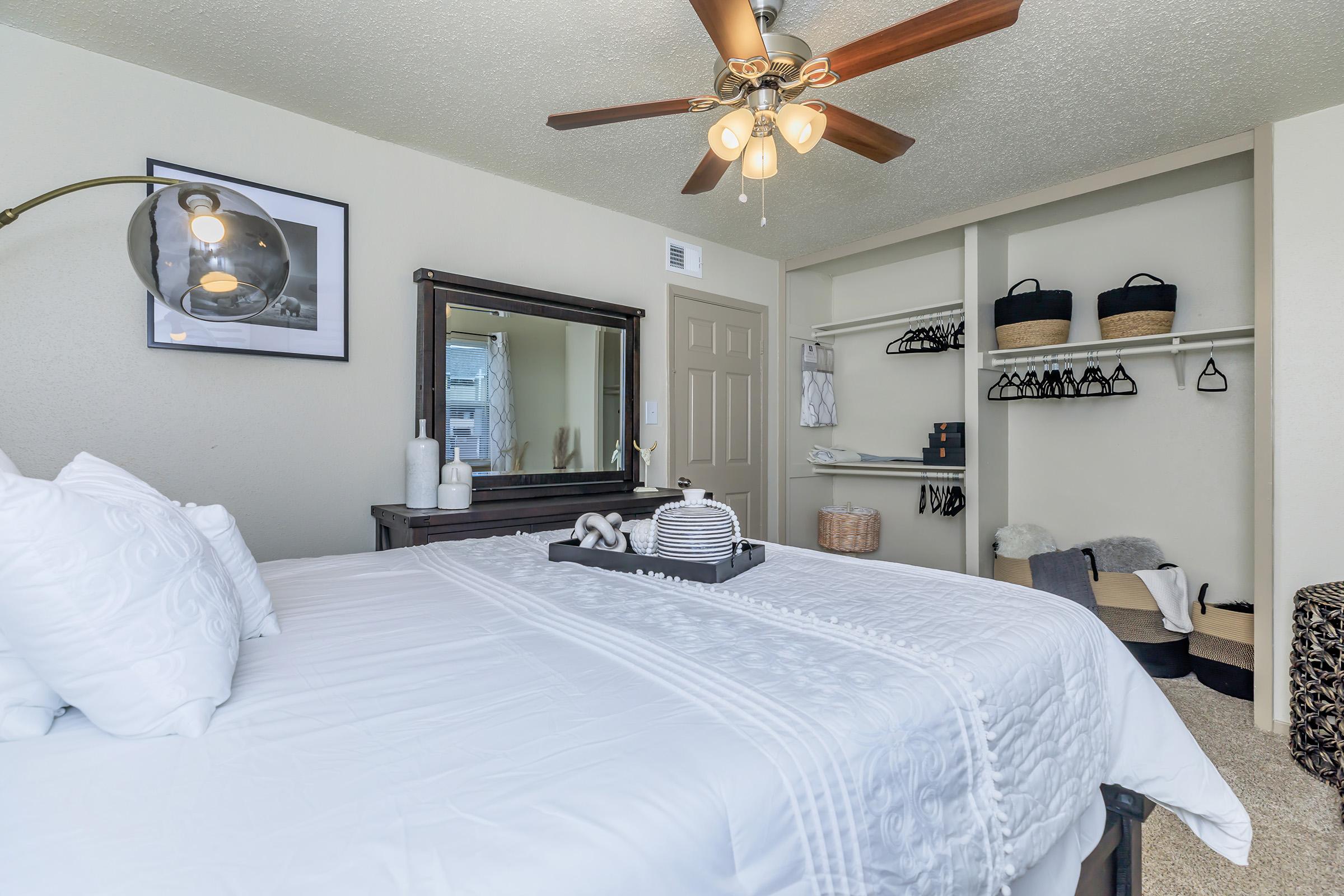 a bedroom with a bed in a hotel room