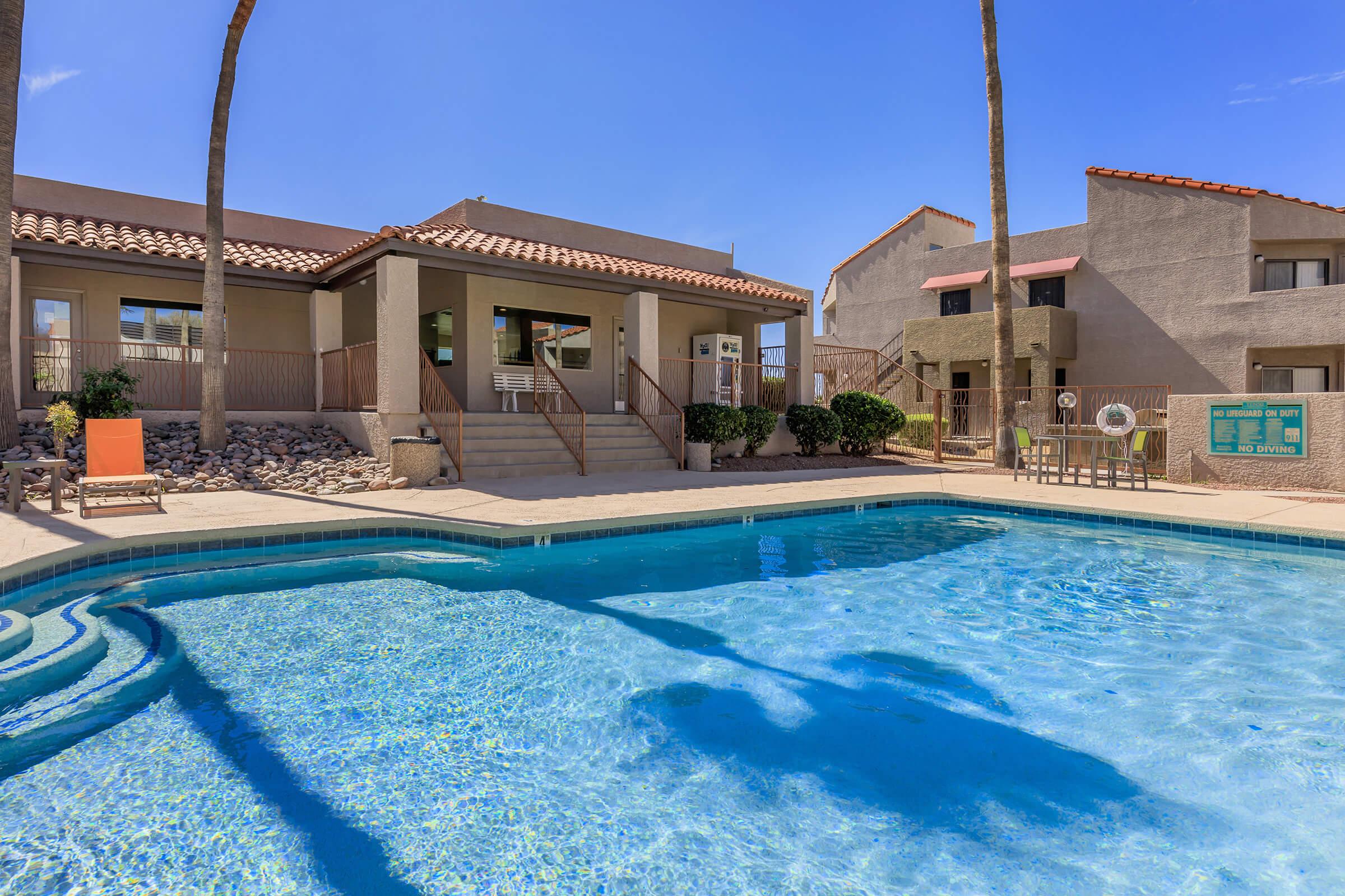 a house with a large pool of water