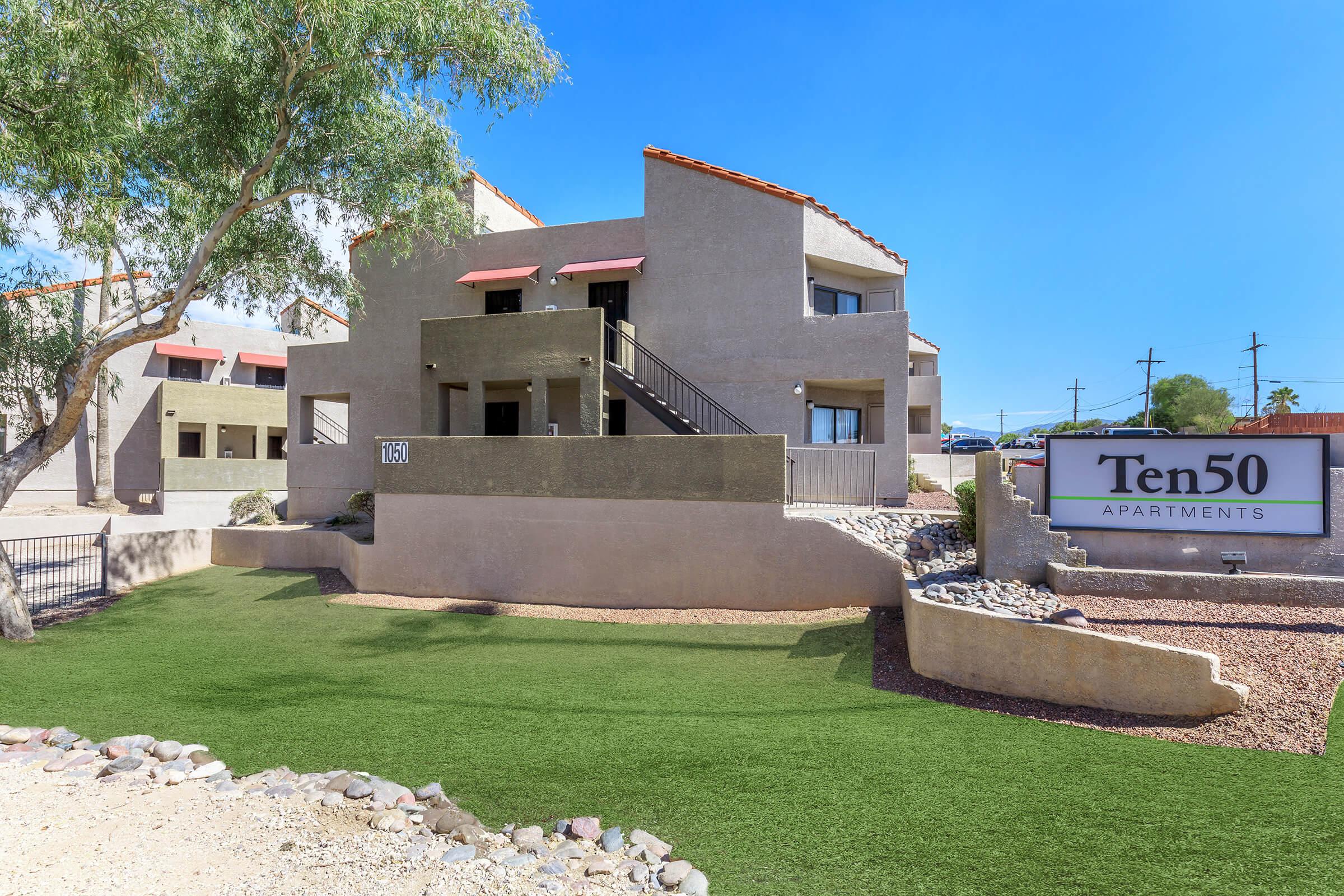 a large lawn in front of a building