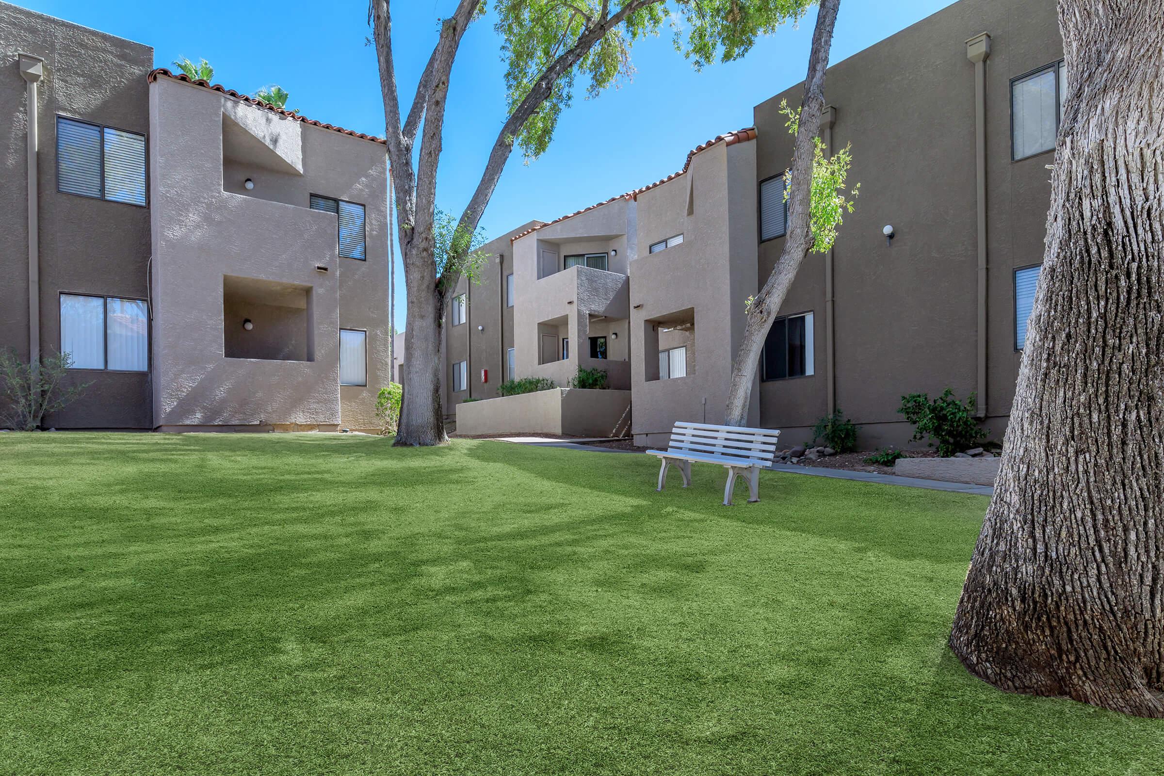 a large lawn in front of a house