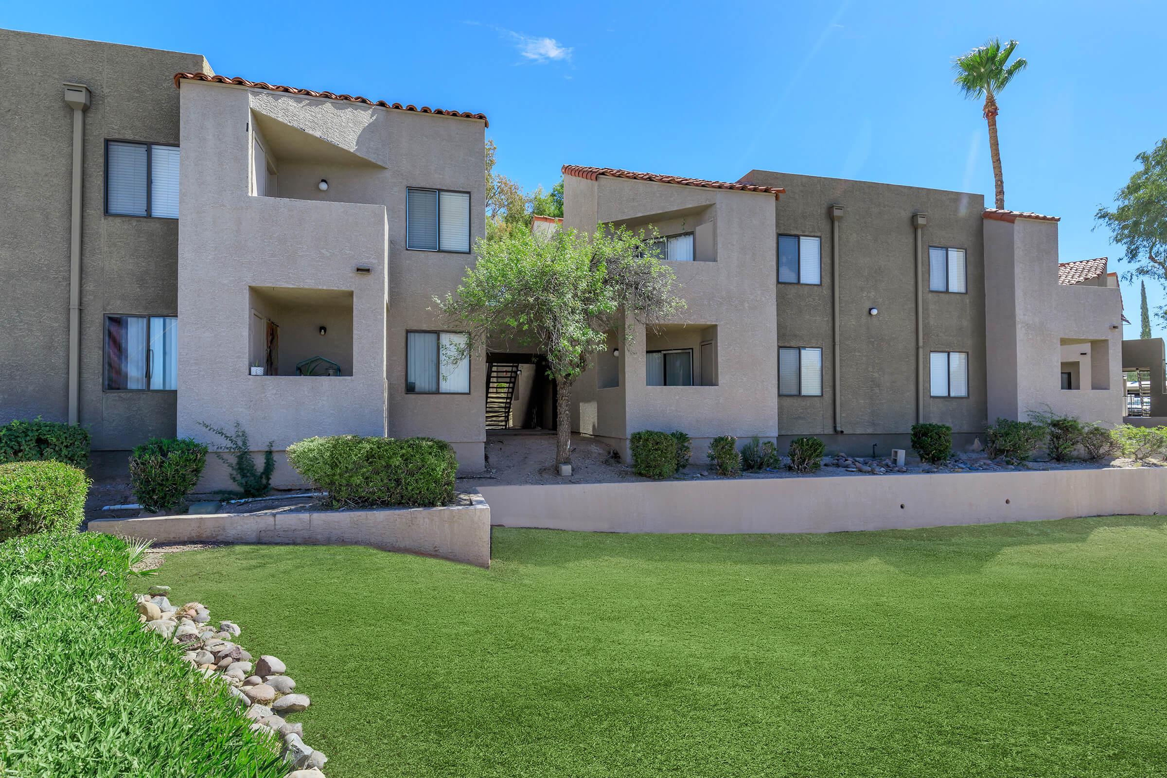 a large lawn in front of a house