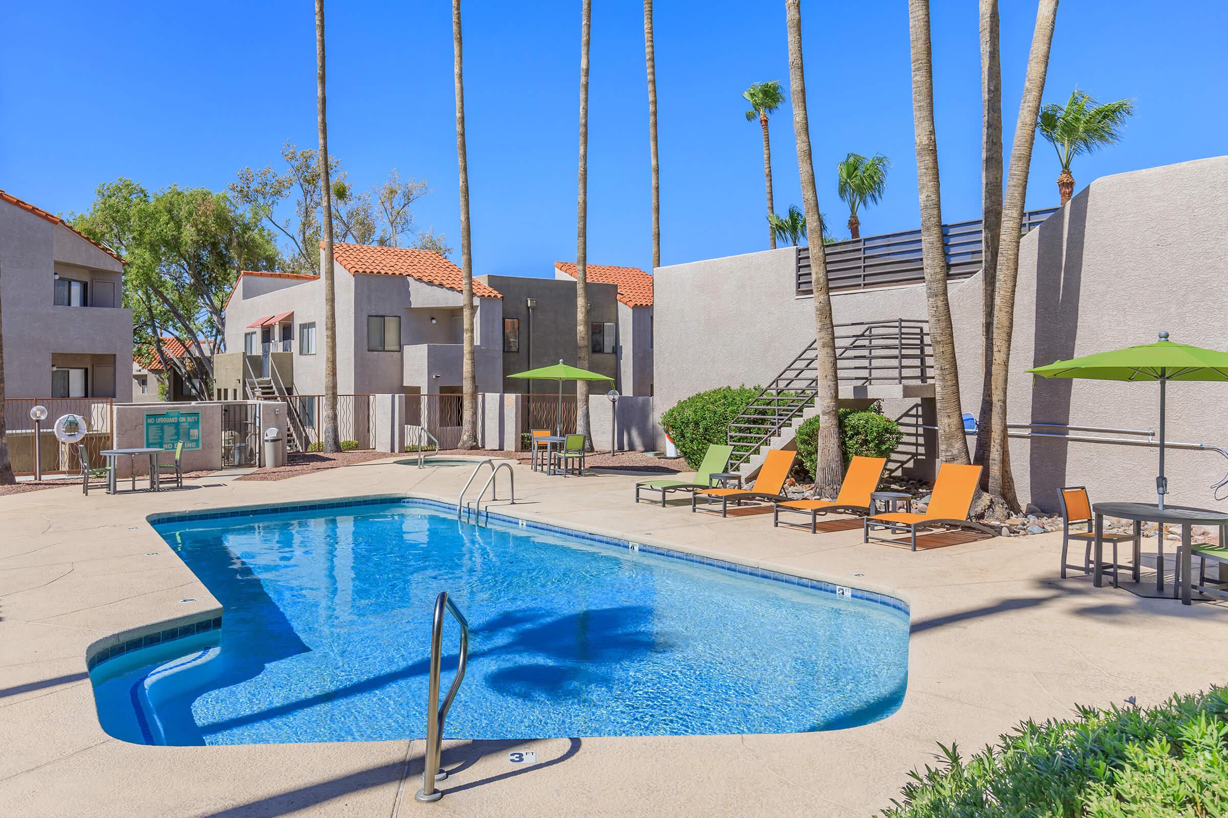 a pool in front of a building