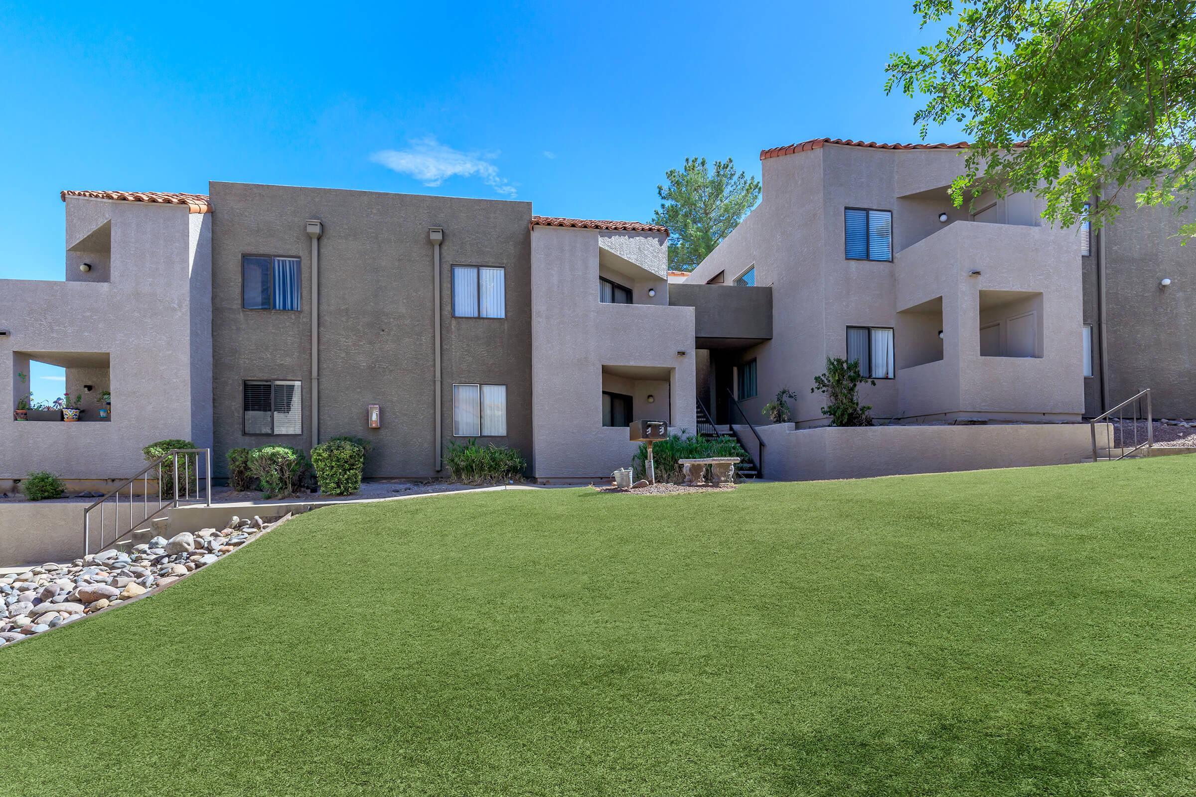 a large lawn in front of a house